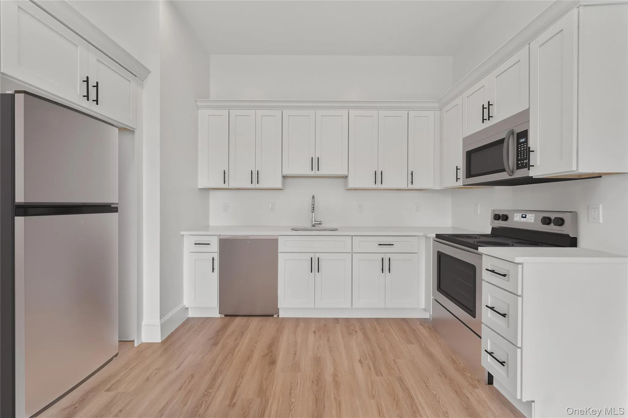 Kitchen with stainless steel appliances Kitchen with stainless steel appliances