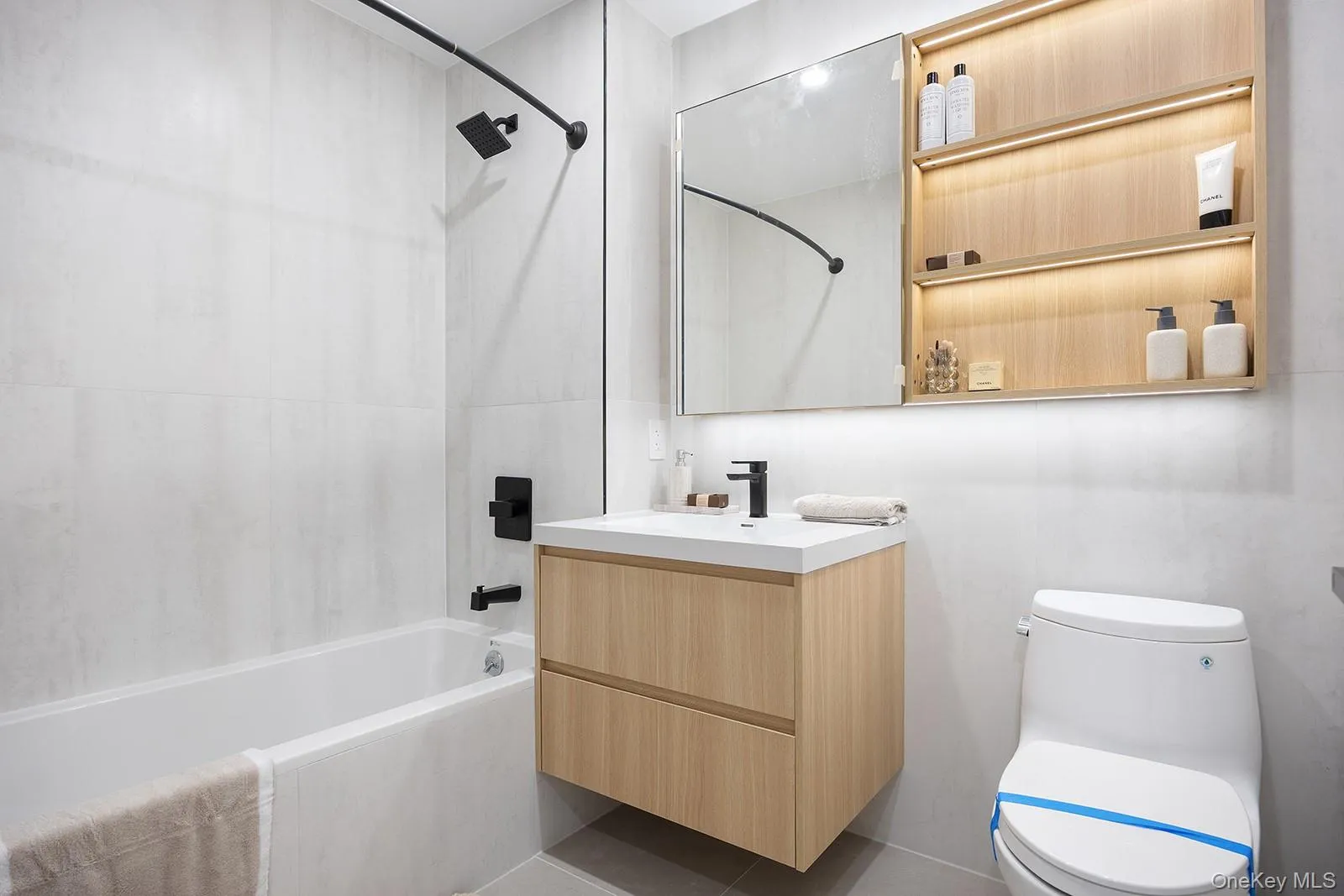 Full bathroom with shower / tub combination and vanity Full bathroom with shower / tub combination and vanity