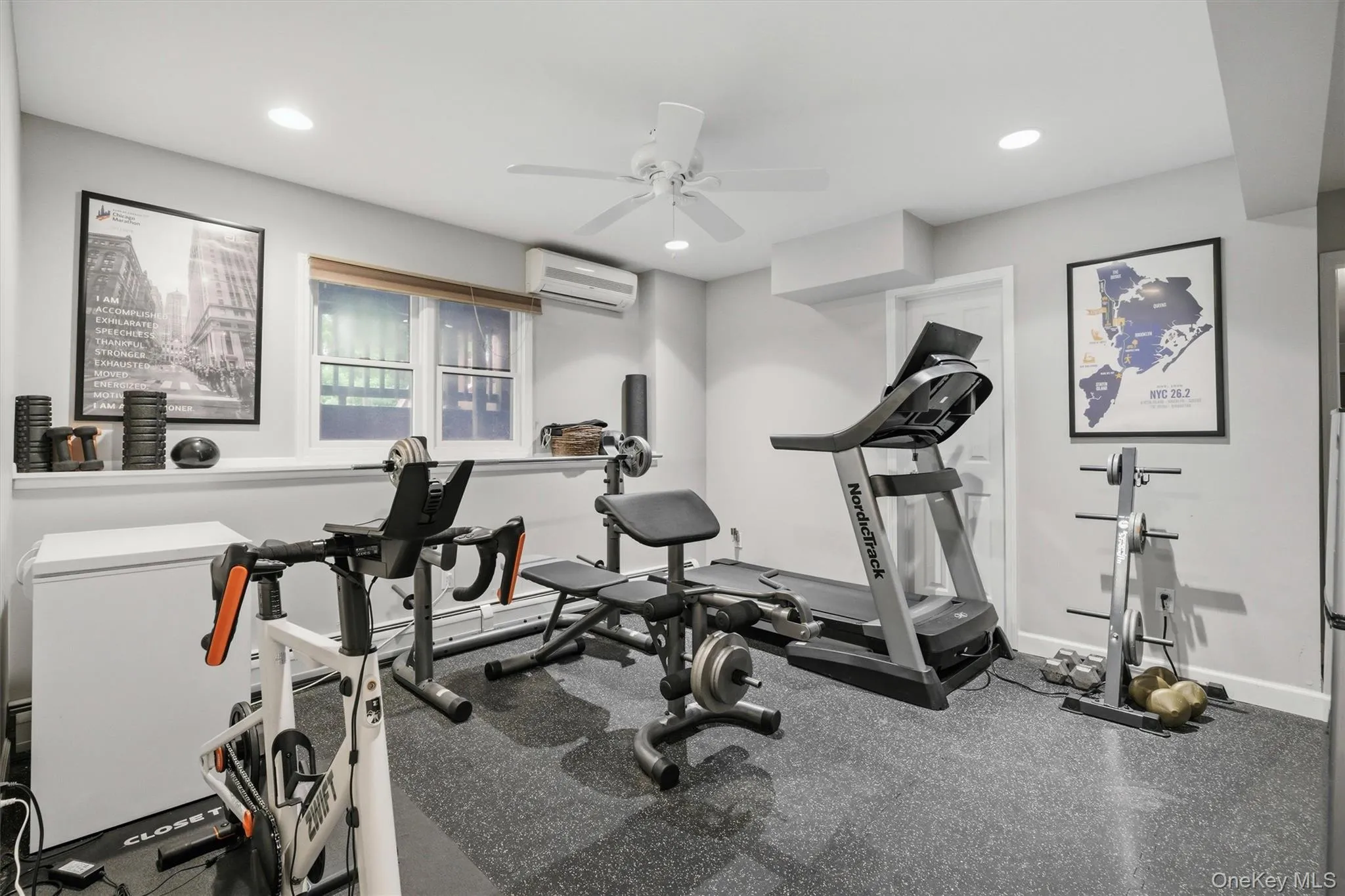 Lower level bonus room used as gym. Lower level bonus room used as gym.