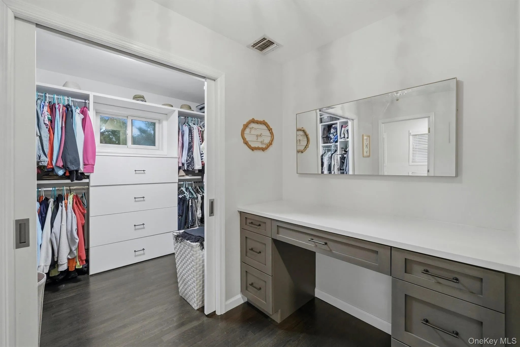 Primary Walk-in Closet and Changing Area. Primary Walk-in Closet and Changing Area.