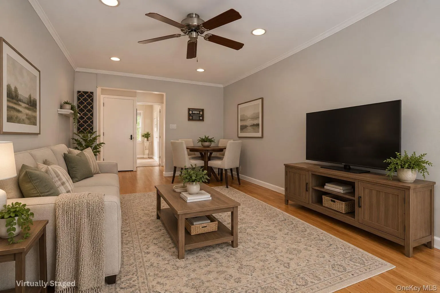 Living room features a cozy eating area, virtually staged Living room features a cozy eating area, virtually staged