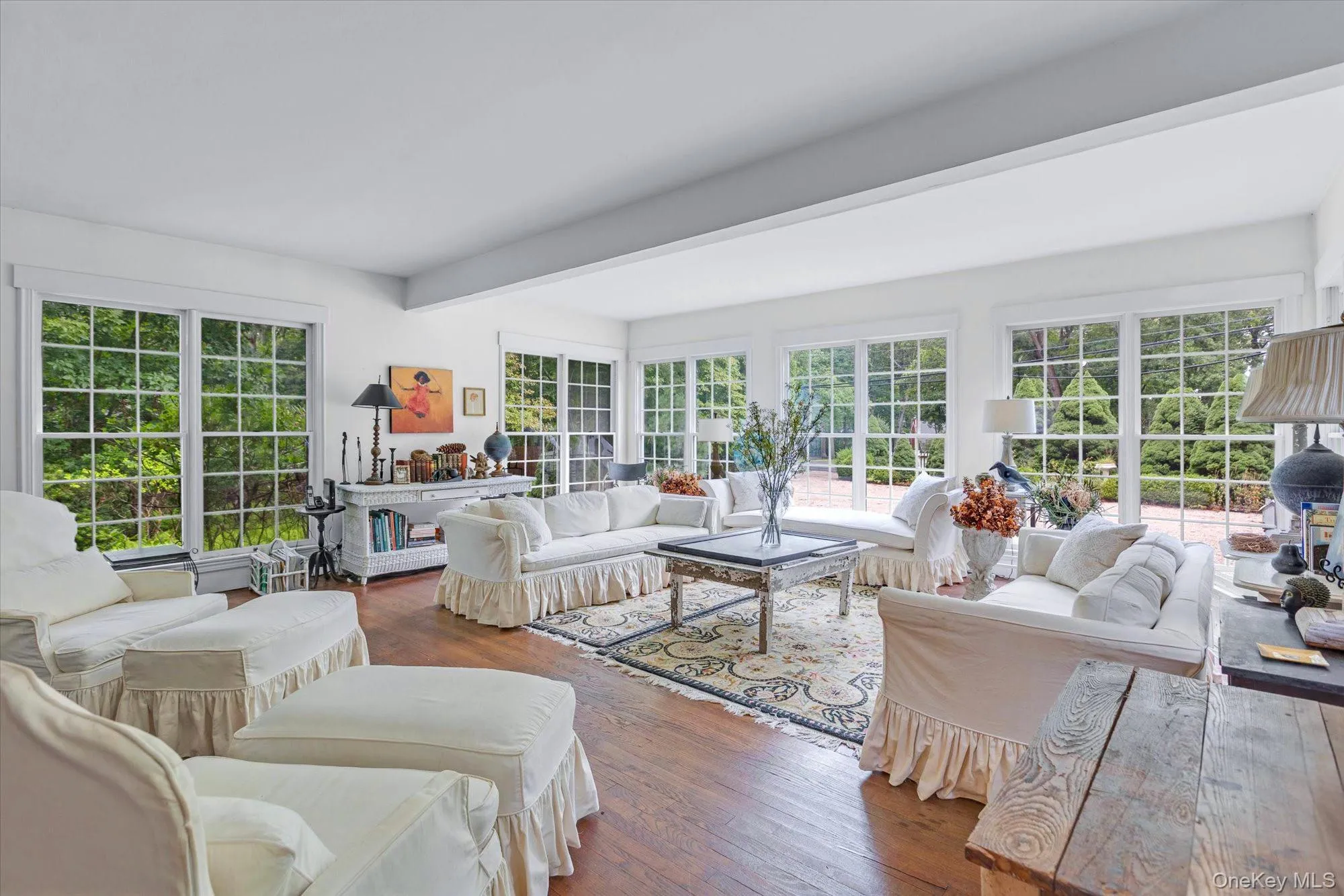 Living Room With Floor To Ceiling Windows, Built-Ins & Wood Burning Fireplace Living Room With Floor To Ceiling Windows, Built-Ins & Wood Burning Fireplace