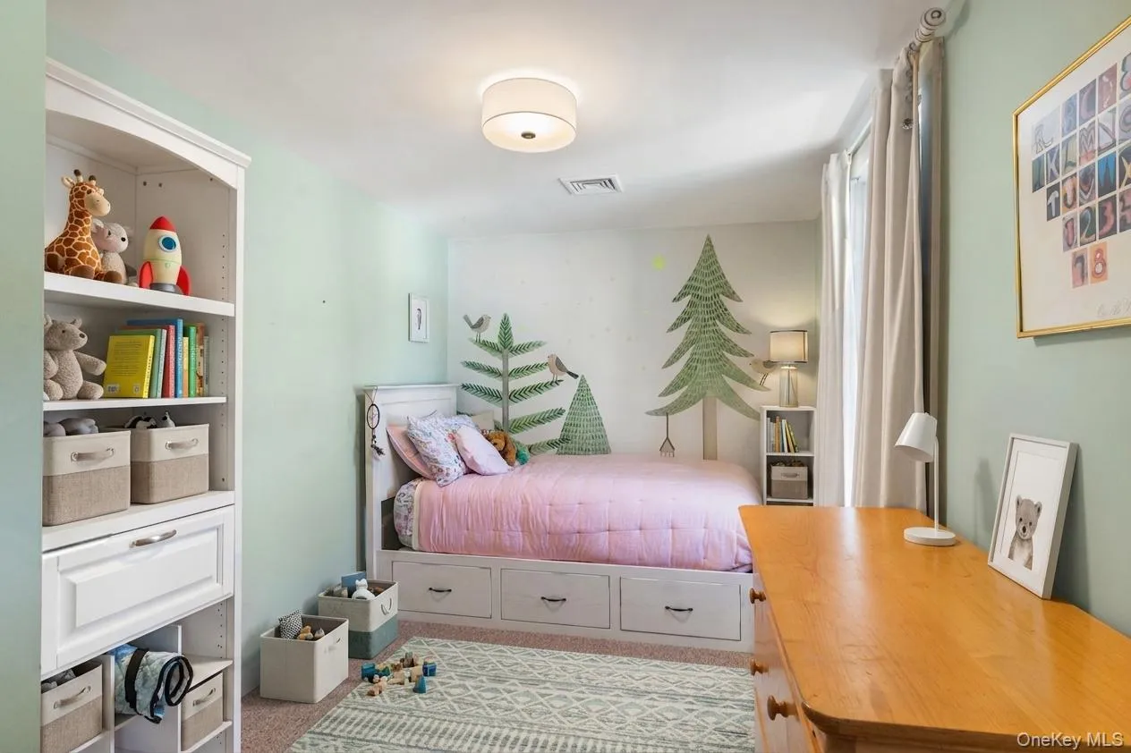 Recessed lighting and a flush mount fixture illuminate the space Recessed lighting and a flush mount fixture illuminate the space