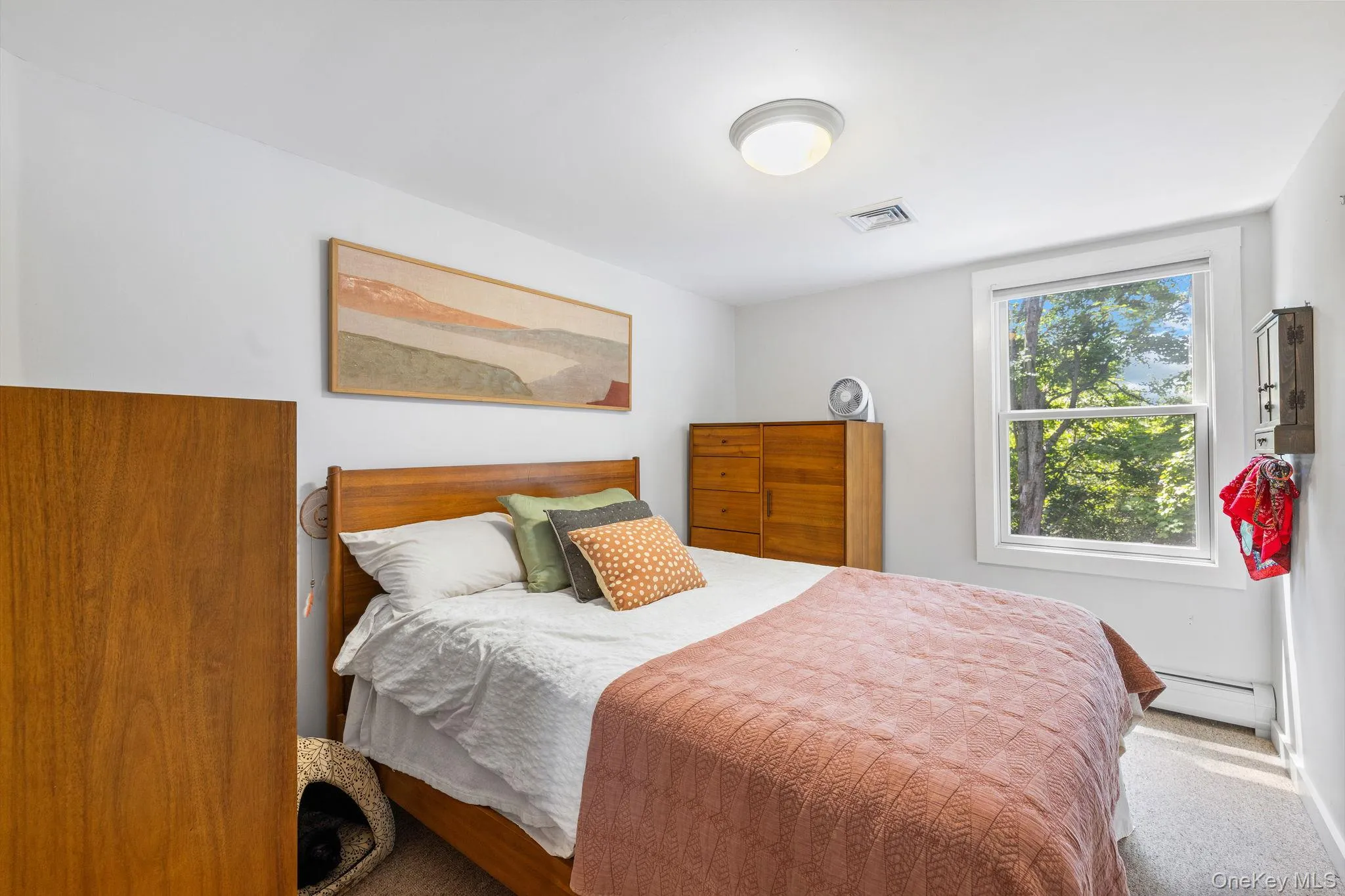 Recessed lighting, single pane window, and carpeted flooring Recessed lighting, single pane window, and carpeted flooring
