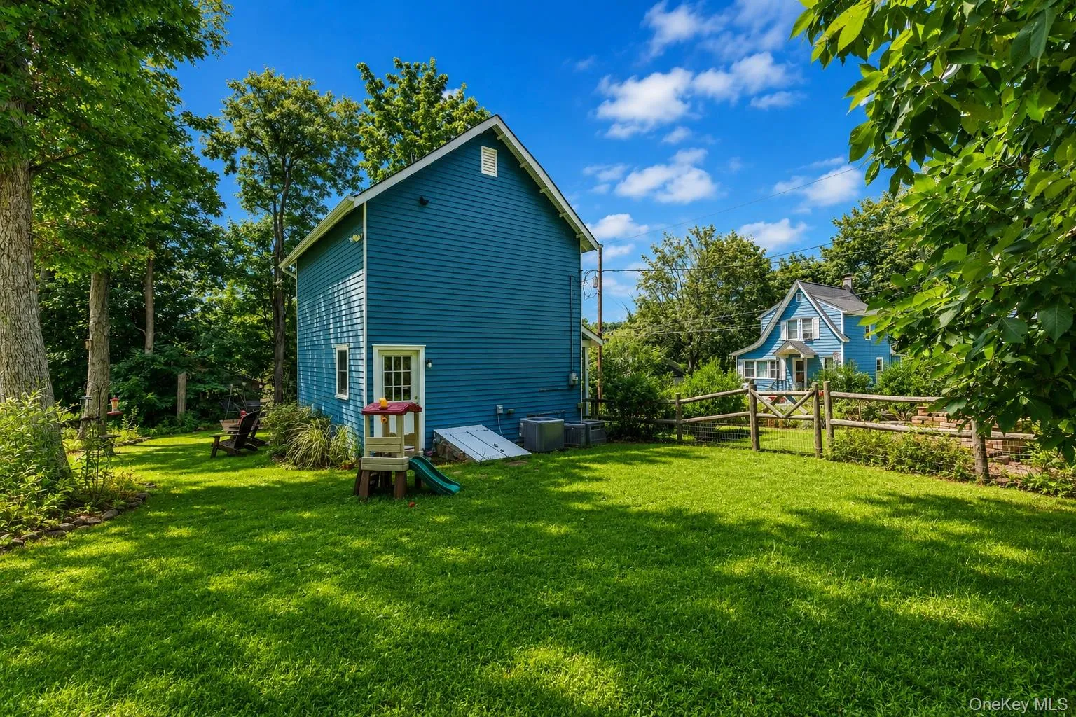Side of Structure featuring expansive yard. Side of Structure featuring expansive yard.