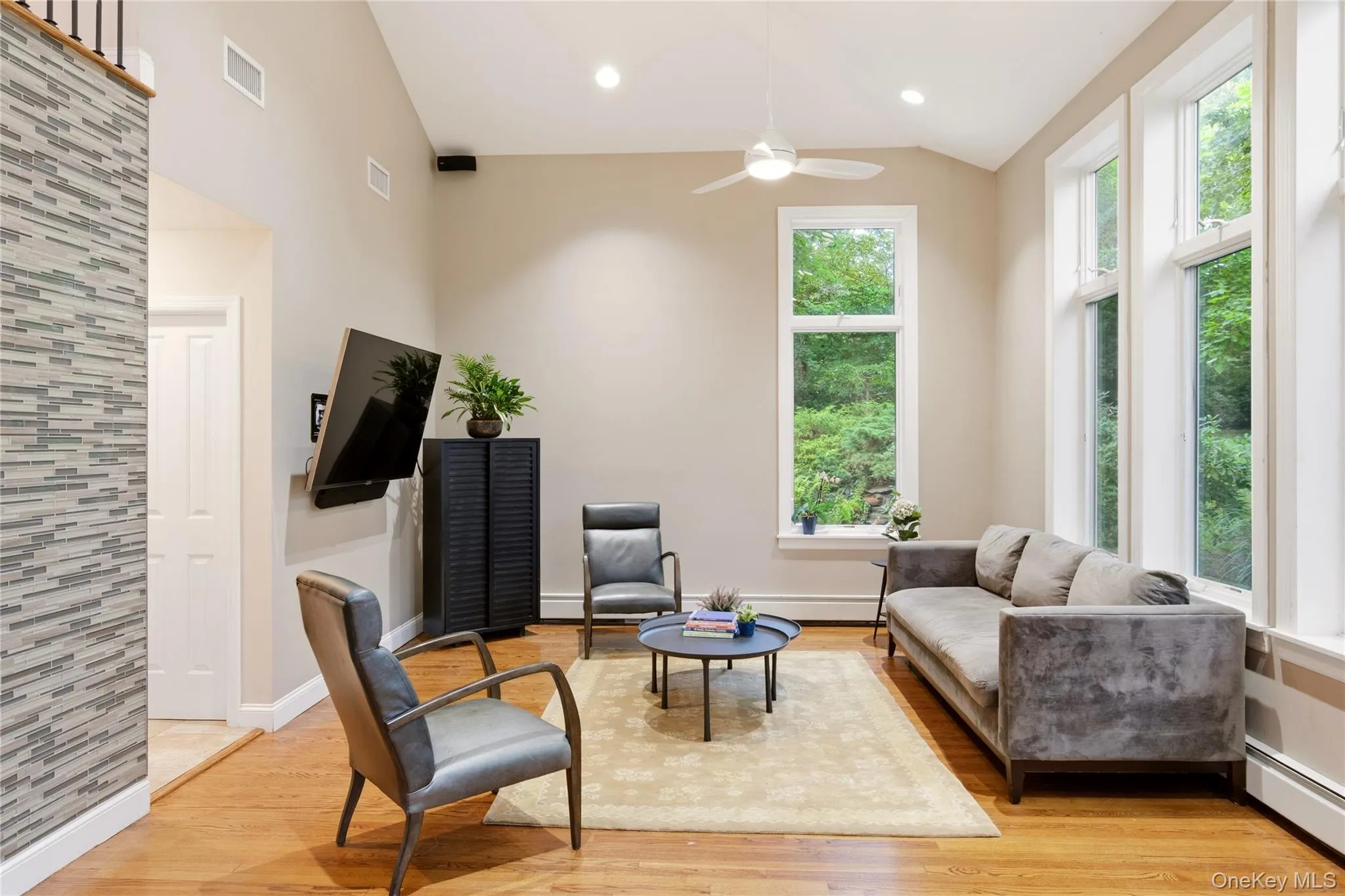 Stunning 2-Story Living Room Brings The Outside In Stunning 2-Story Living Room Brings The Outside In