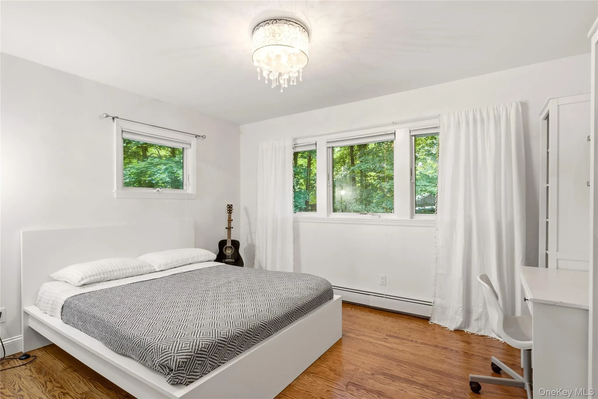 Spacious Third Bedroom with Wood Floors Spacious Third Bedroom with Wood Floors