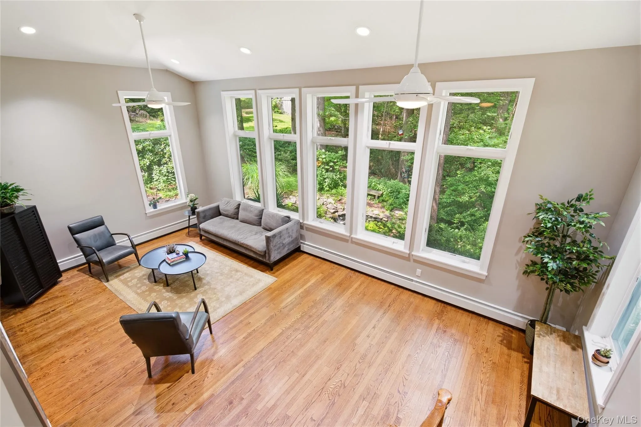 Floor To Ceiling Windows Frame The Landscape Beyond Floor To Ceiling Windows Frame The Landscape Beyond