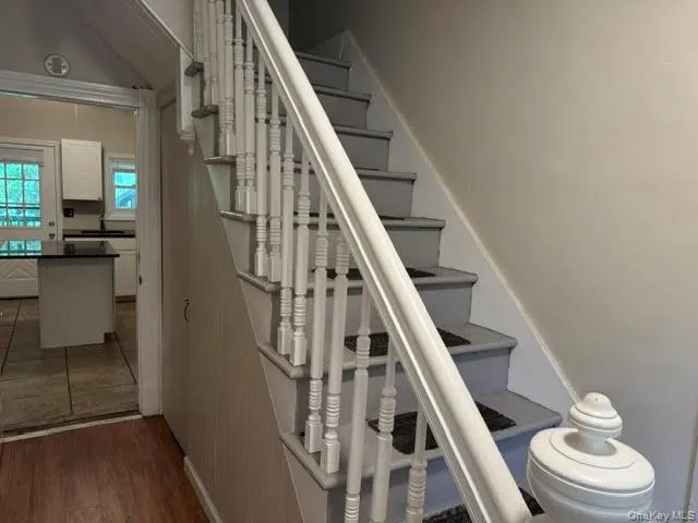 Entry into the building and common area with view of the stairs going to unit #2 on second floor. Entry into the building and common area with view of the stairs going to unit #2 on second floor.
