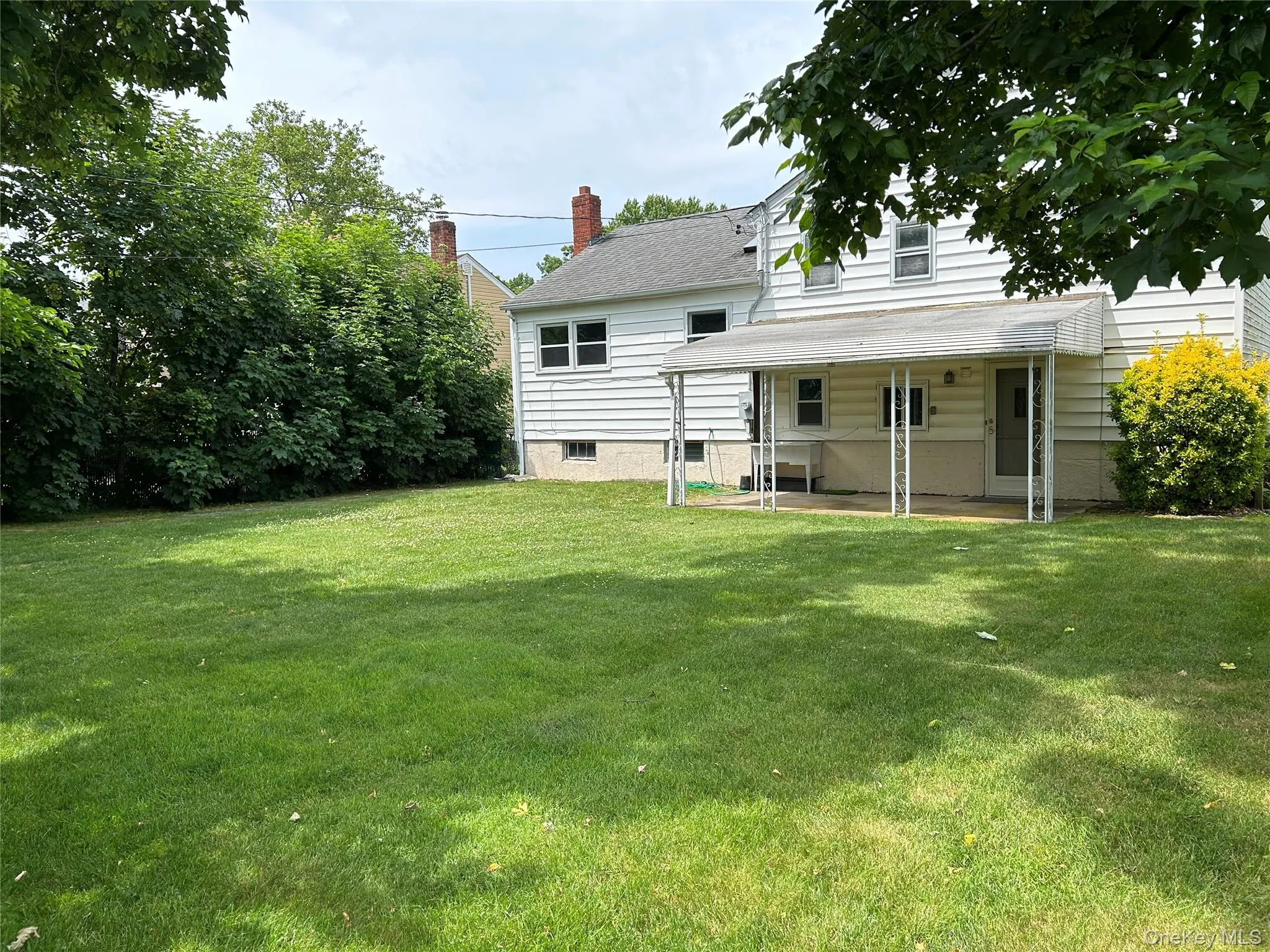 Covered Patio and Fully Fenced Yard Covered Patio and Fully Fenced Yard