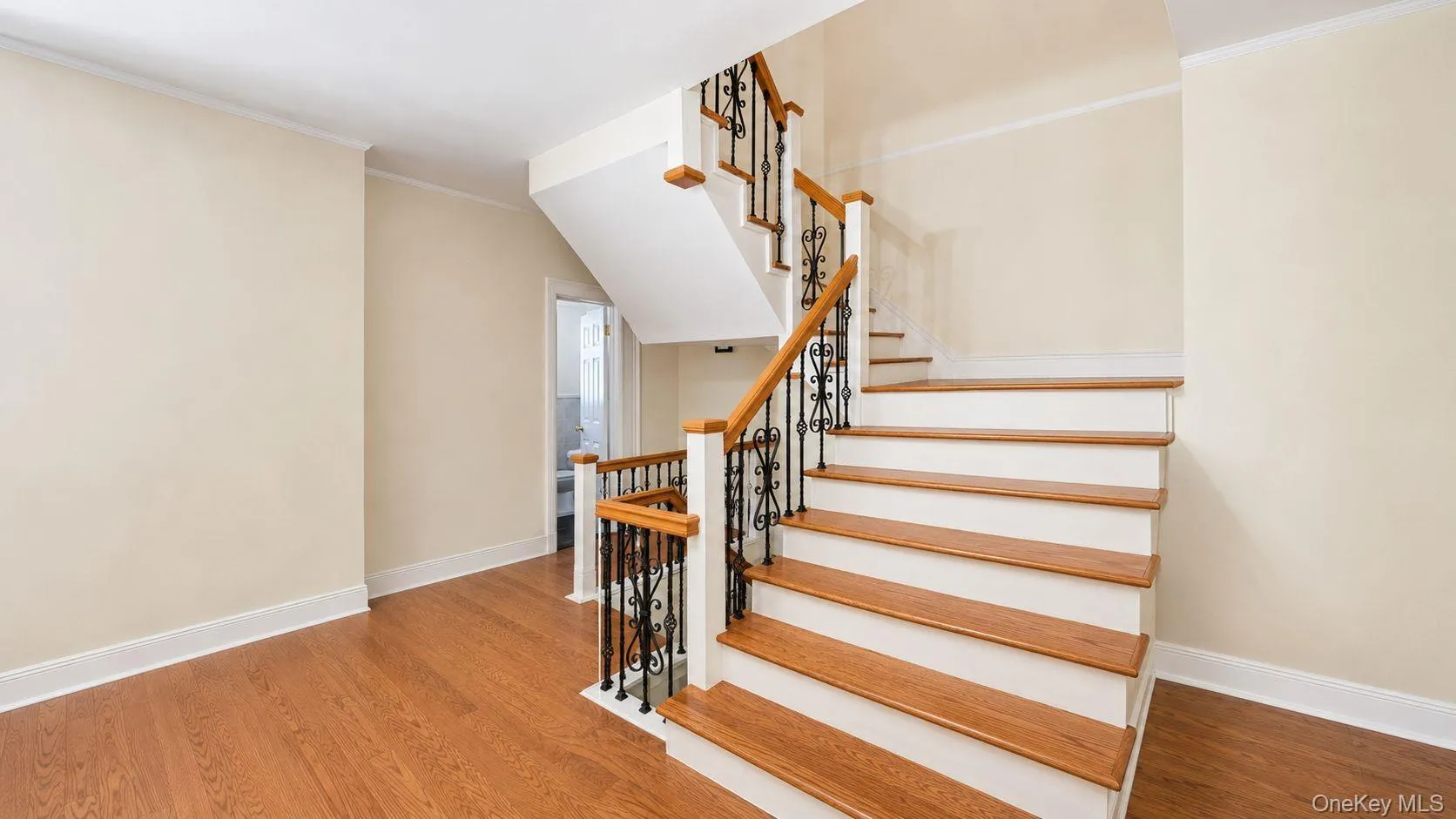 Hardwood flooring throughout the main level and staircase Hardwood flooring throughout the main level and staircase
