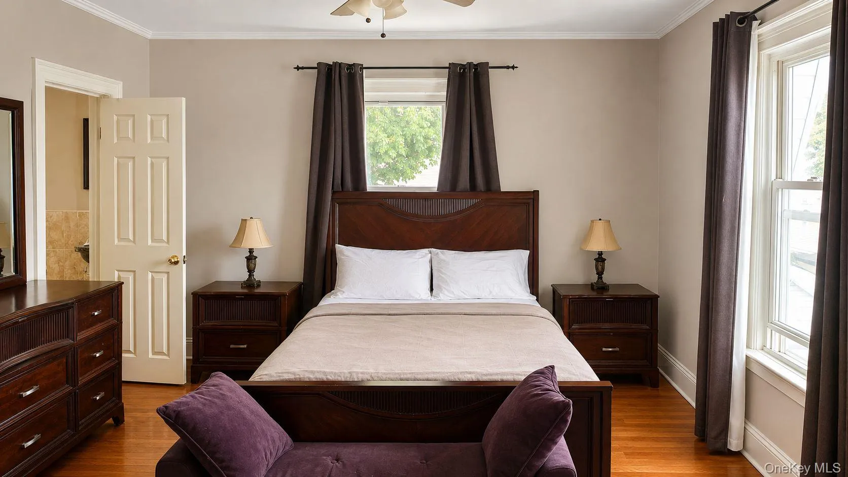 Room featuring wood-finish flooring, a ceiling fan, and crown molding Room featuring wood-finish flooring, a ceiling fan, and crown molding
