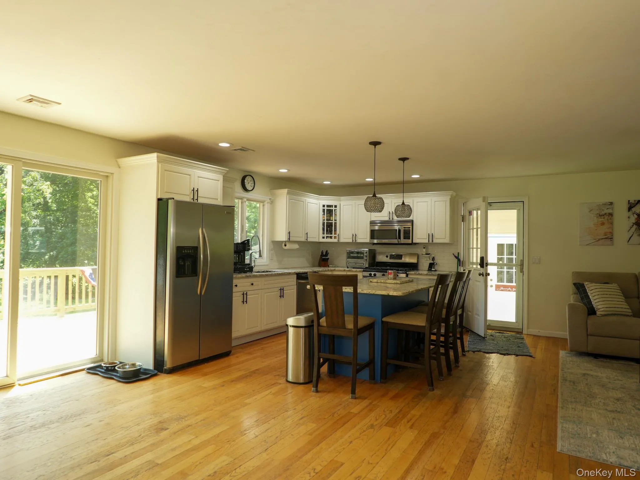 Updated gourmet kitchen with stainless steel appliances, plenty of room at the built-in granite island, in addition to a separate dining area. Updated gourmet kitchen with stainless steel appliances, plenty of room at the built-in granite island, in addition to a separate dining area.