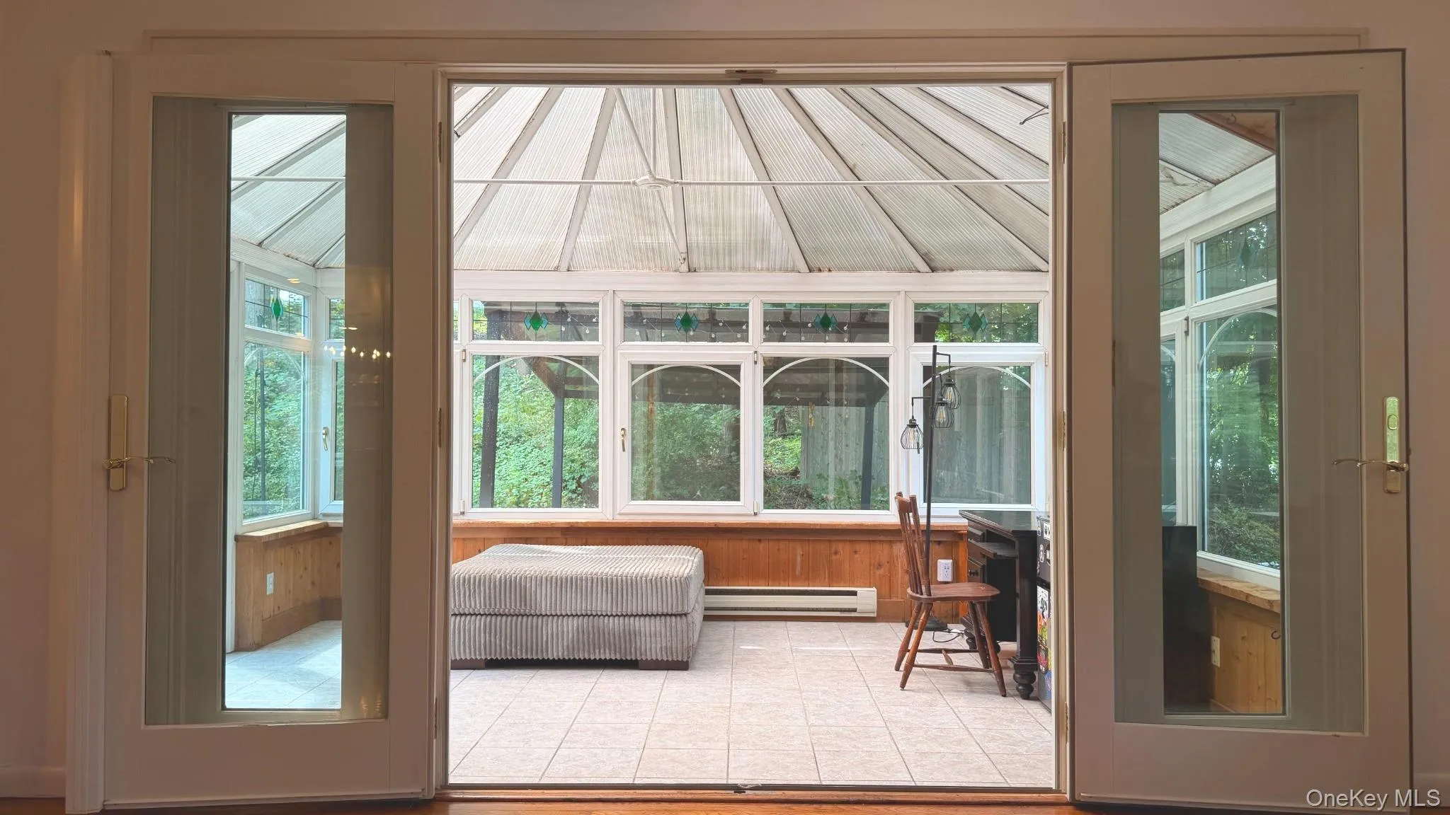 Four-season sunroom off the primary bedroom Four-season sunroom off the primary bedroom