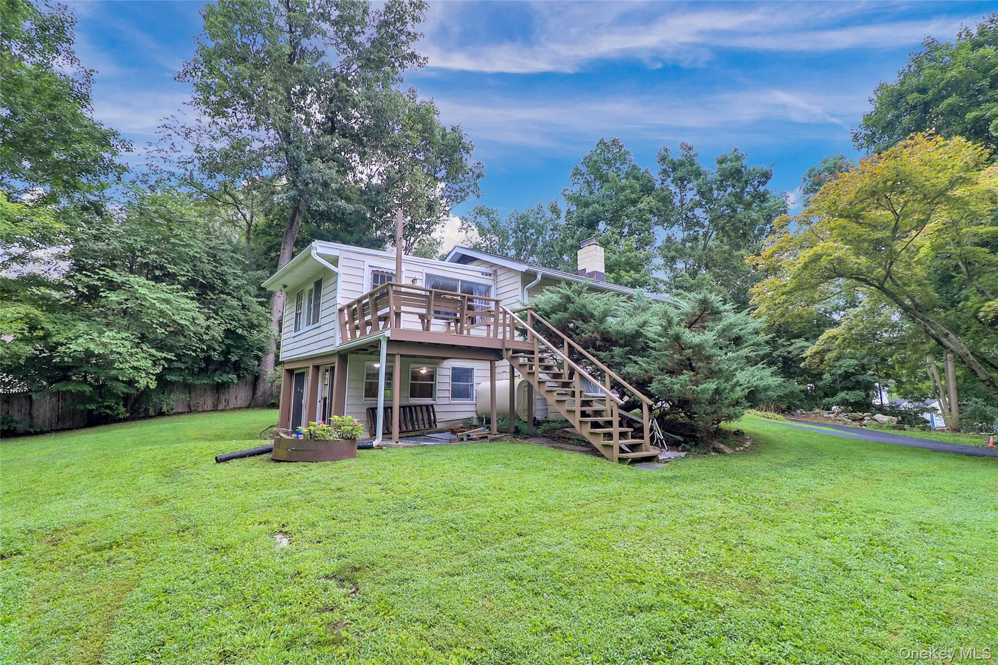 Sunrooms and deck overlook private yard and stunning Japanese Maple Sunrooms and deck overlook private yard and stunning Japanese Maple