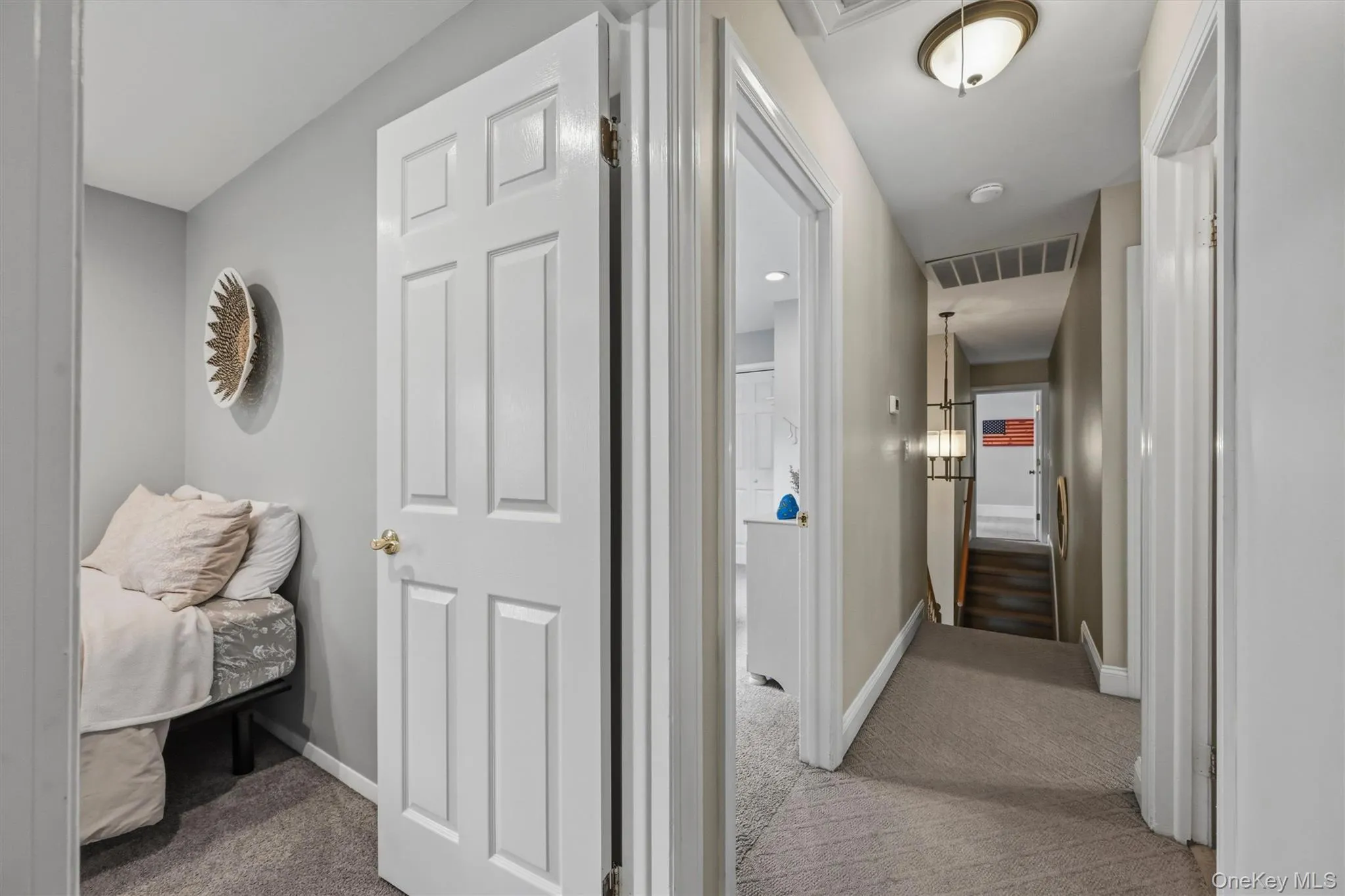 The right part of the upstairs is host to three bedrooms and the primary suite. The right part of the upstairs is host to three bedrooms and the primary suite.