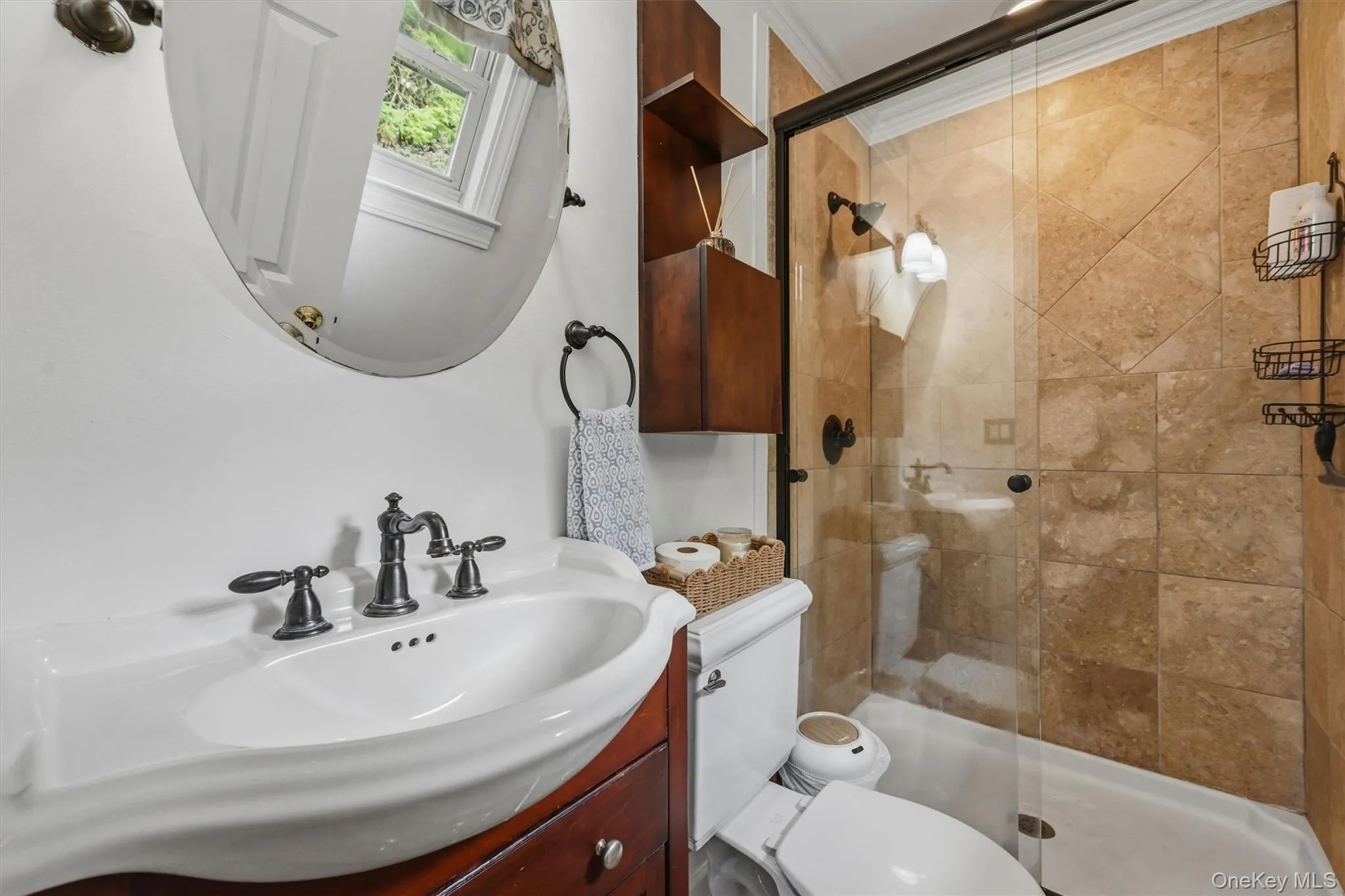 The primary bathroom has a tiled shower. The primary bathroom has a tiled shower.