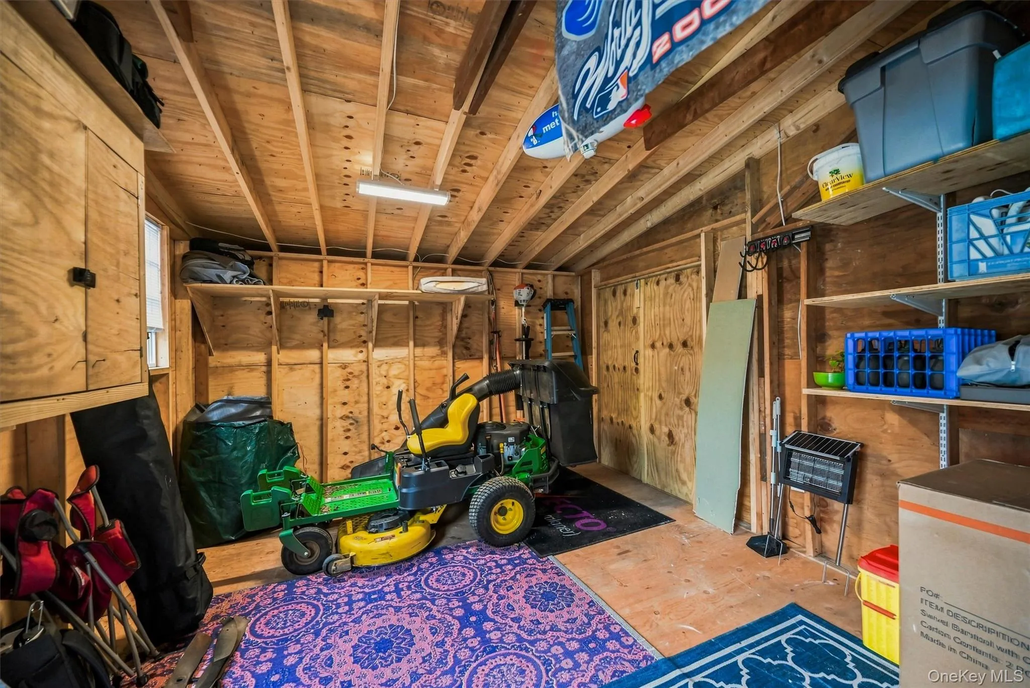 The shed has two access point for easy in and out with a mower. The shed has two access point for easy in and out with a mower.
