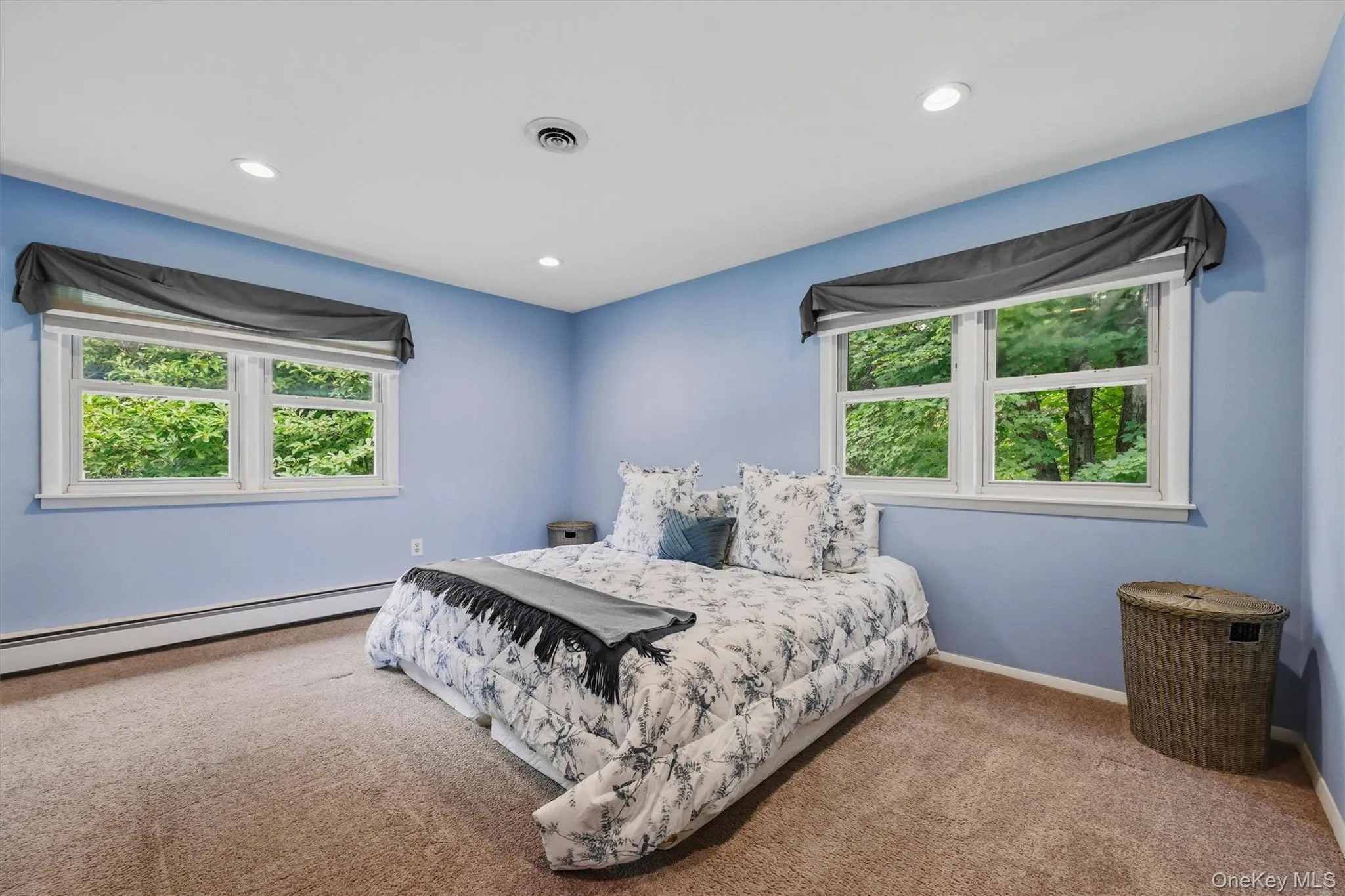 There are two windows allowing natural light. There are two windows allowing natural light.