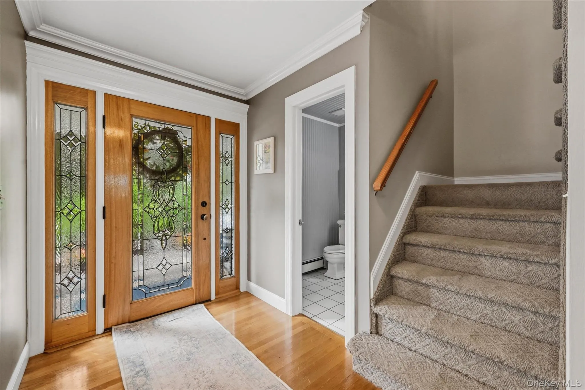 Hardwood floors, crown molding, a solid cherry door and that's just the foyer! Hardwood floors, crown molding, a solid cherry door and that's just the foyer!