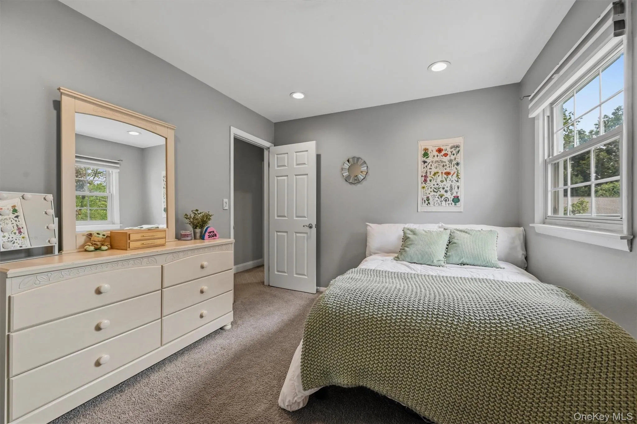 The room is large with recessed lights The room is large with recessed lights