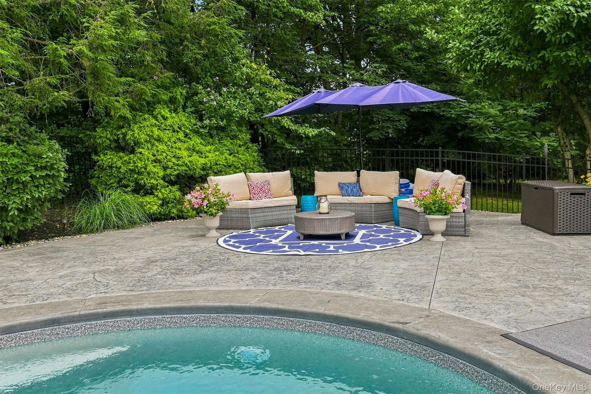 The pool has built in seating in both the shallow end and deep end. The pool has built in seating in both the shallow end and deep end.