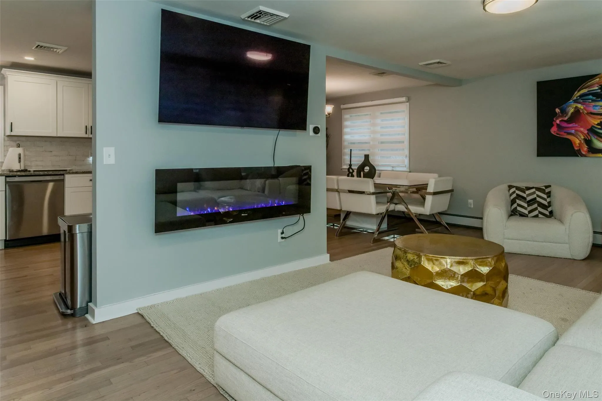 Living room featuring light hardwood / wood-style floors Living room featuring light hardwood / wood-style floors