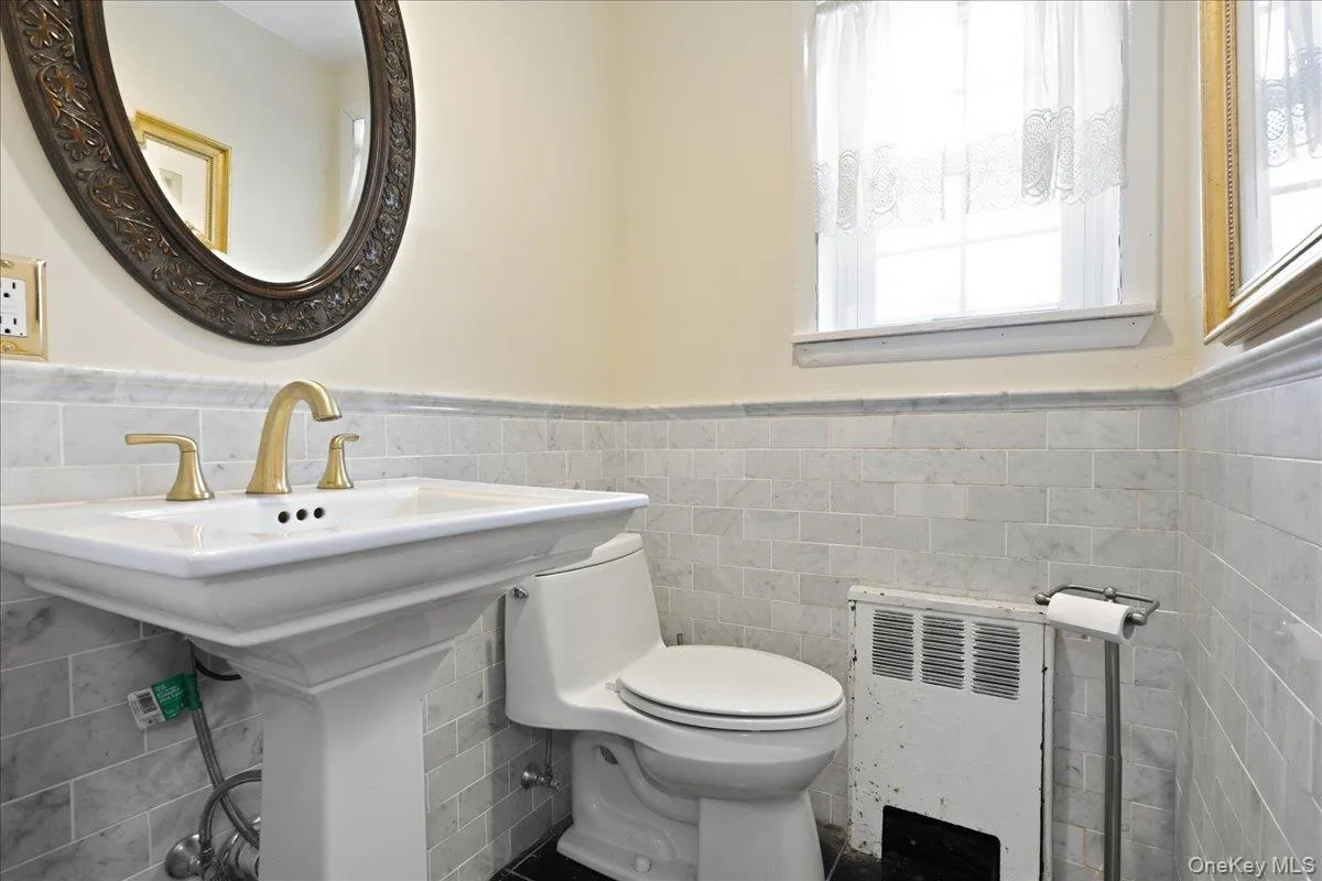Half Bath next to Den Half Bath next to Den
