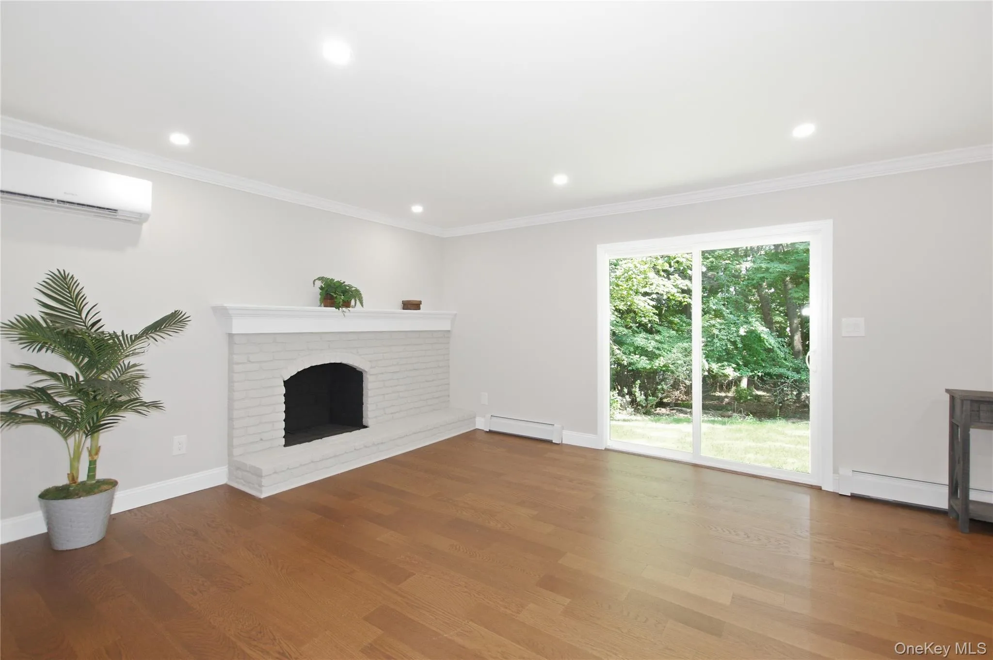 Den w/ Fireplace & Sliding Glass Door To Backyard Den w/ Fireplace & Sliding Glass Door To Backyard