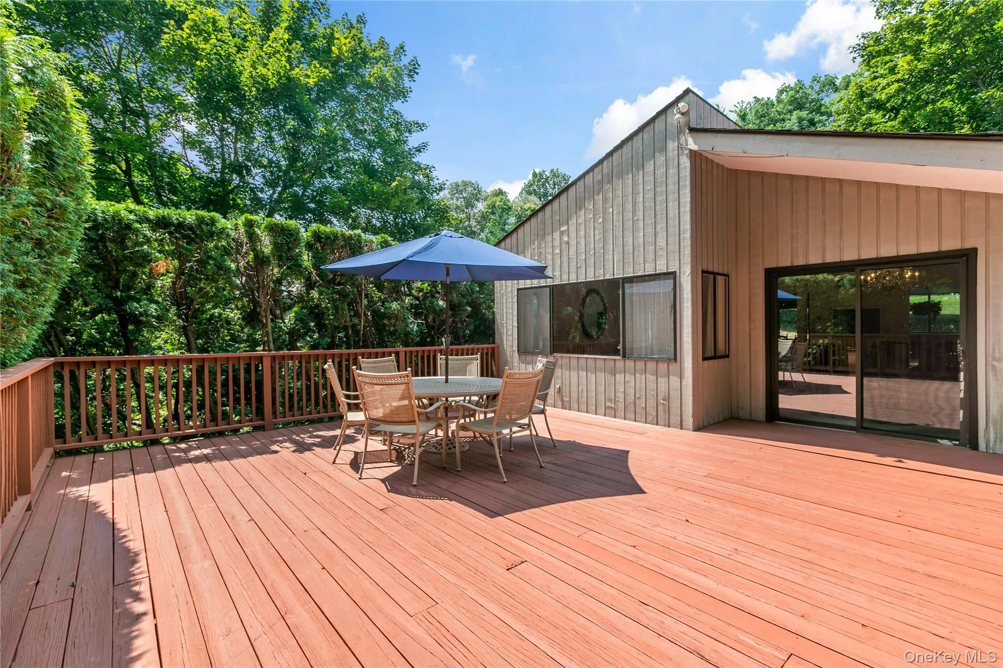 Oversized deck accessed from Dining Room/Living Room. Oversized deck accessed from Dining Room/Living Room.