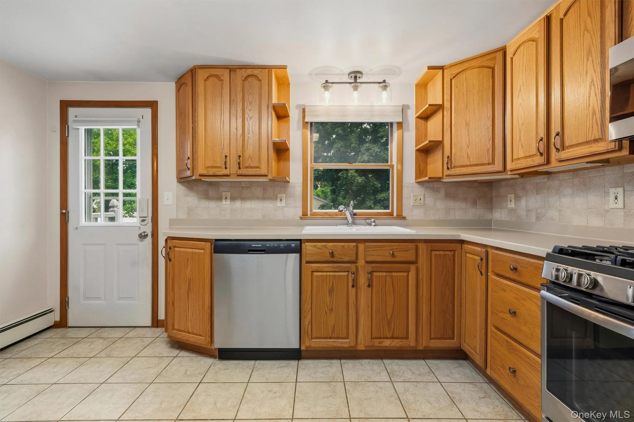 Kitchen w/ Access to Deck & Patio Kitchen w/ Access to Deck & Patio