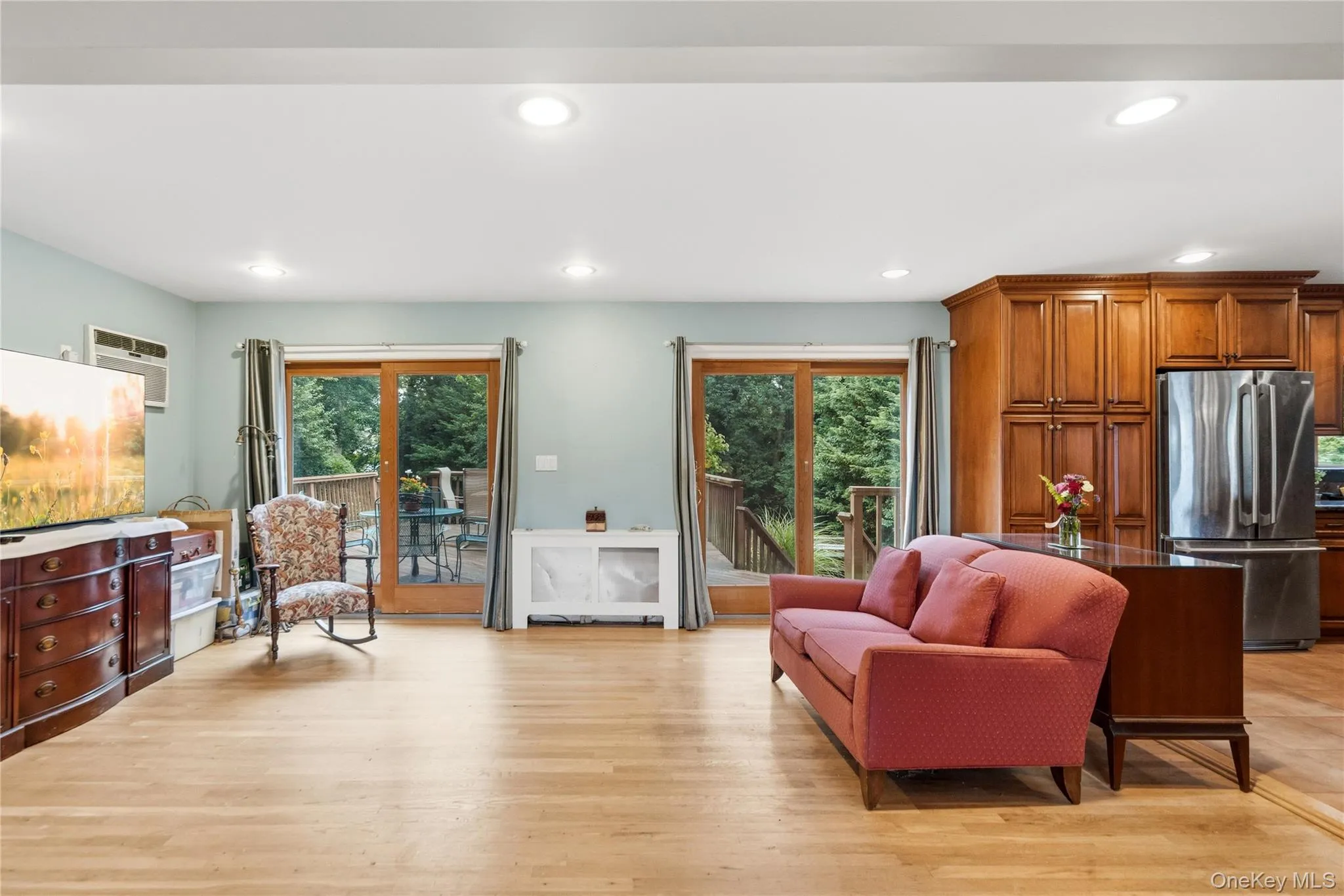 Den with Wall Air Conditioner & 2 French Doors to Backyard Deck Den with Wall Air Conditioner & 2 French Doors to Backyard Deck