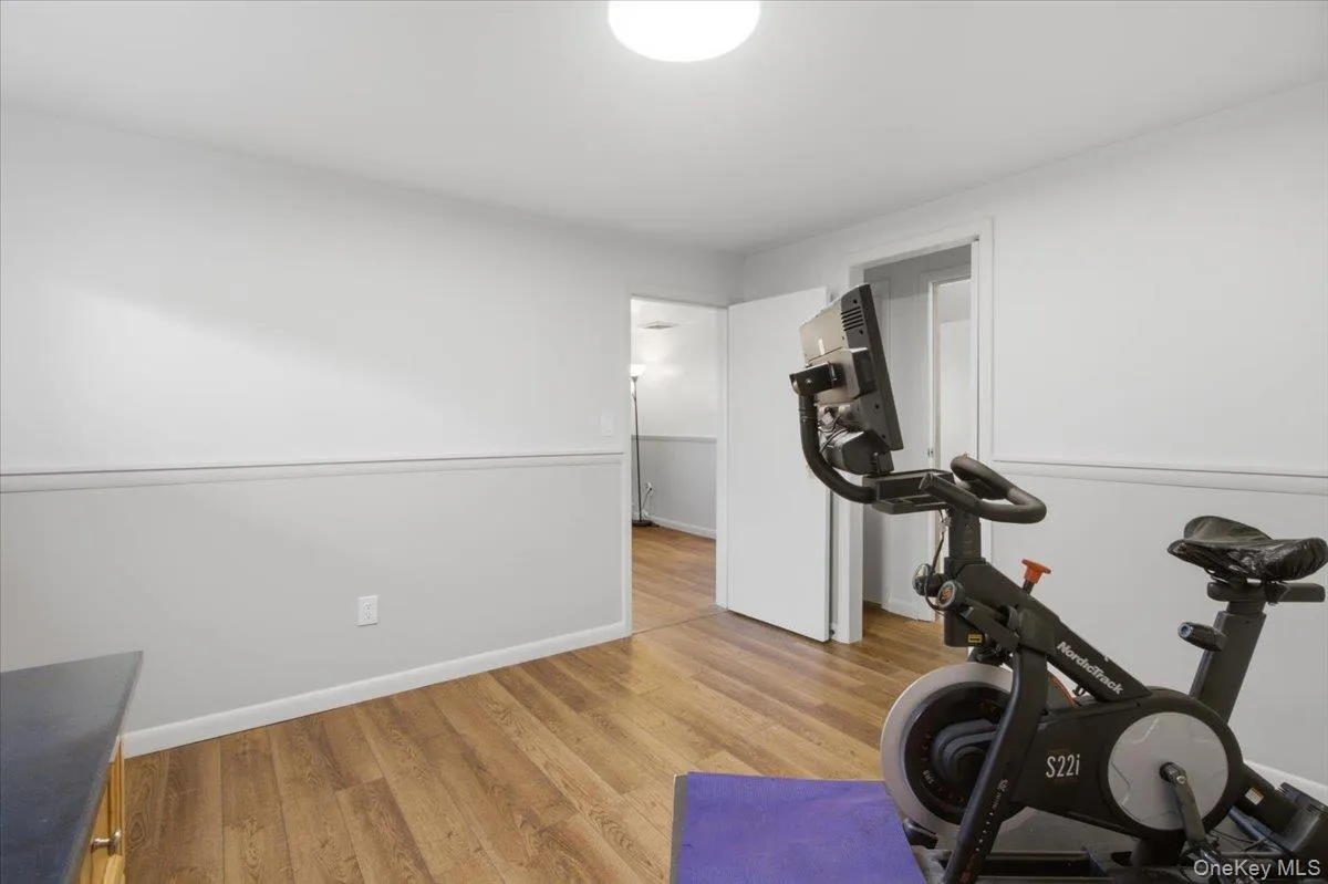 Lower level bedroom also used as a home gym. Lower level bedroom also used as a home gym.