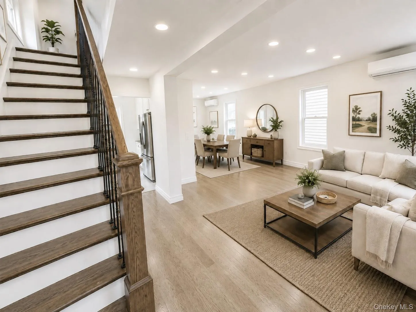 Hardwood staircase with wrought iron balusters Hardwood staircase with wrought iron balusters
