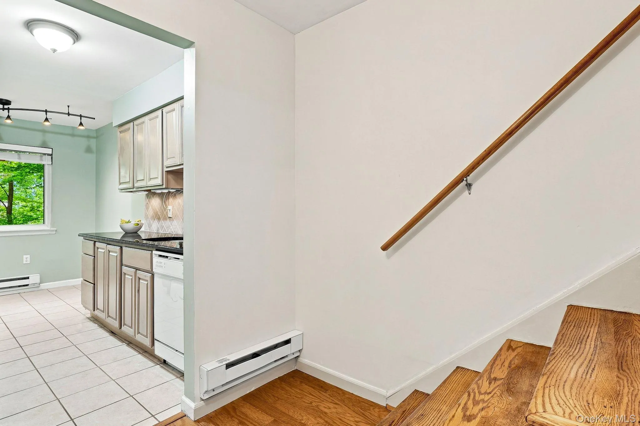 This garden unit is above ground, at entry (right door), to the unit with separate eat-in kitchen, spacious living room with door to deck, bedroom and full bath. This garden unit is above ground, at entry (right door), to the unit with separate eat-in kitchen, spacious living room with door to deck, bedroom and full bath.