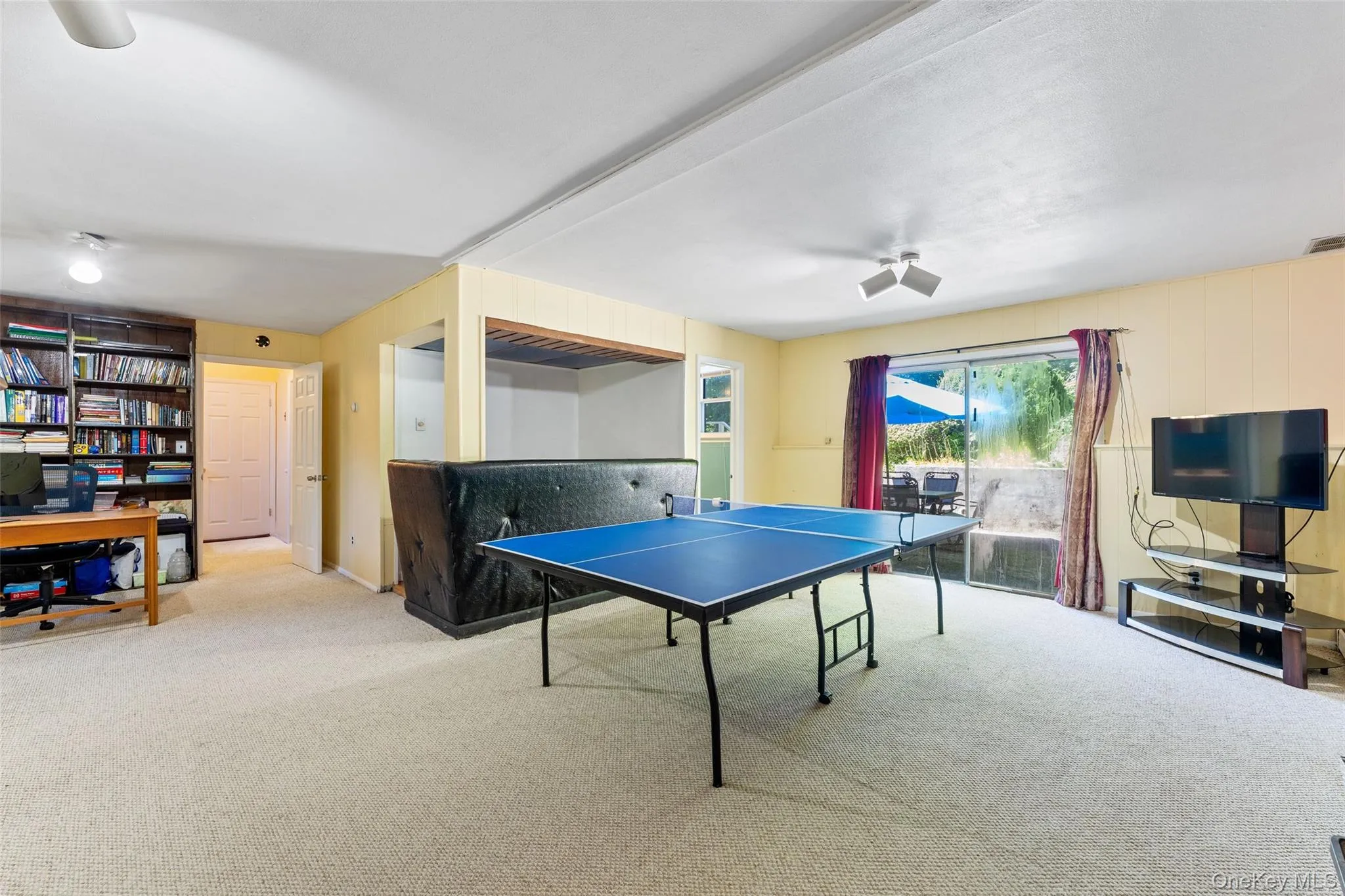 Full, finished basement with bar and bathroom Full, finished basement with bar and bathroom