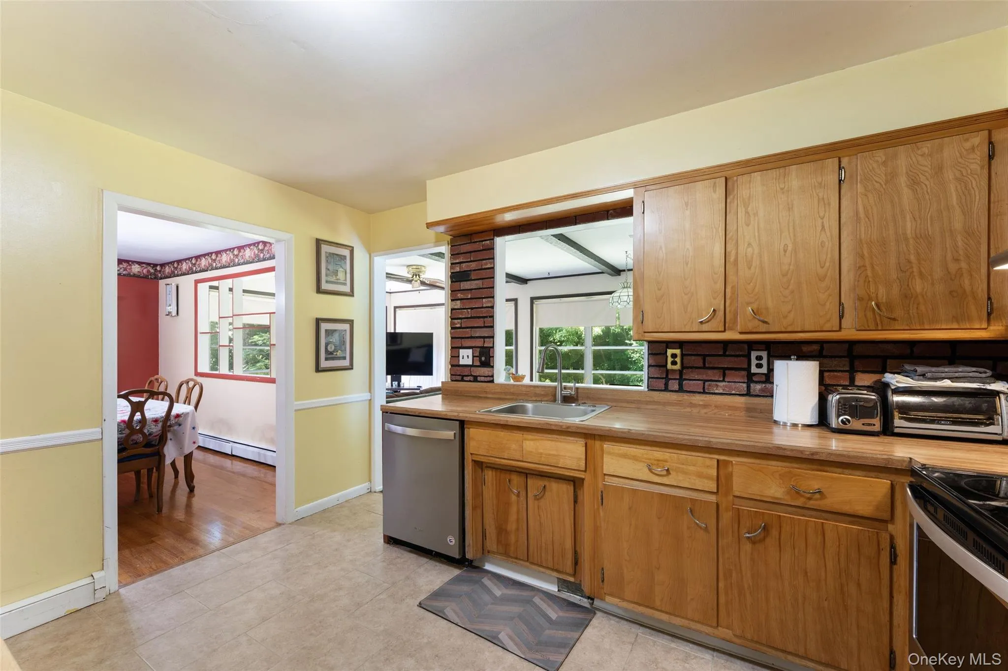 Kitchen leading into dining room and family room Kitchen leading into dining room and family room