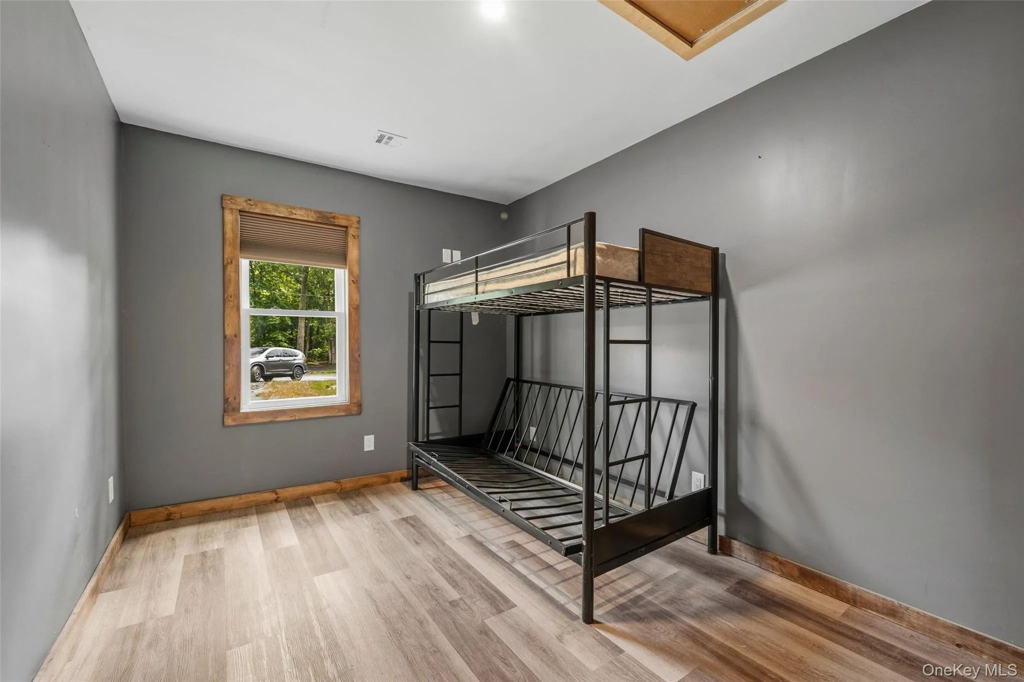 Bedroom #2 with vinyl flooring Bedroom #2 with vinyl flooring