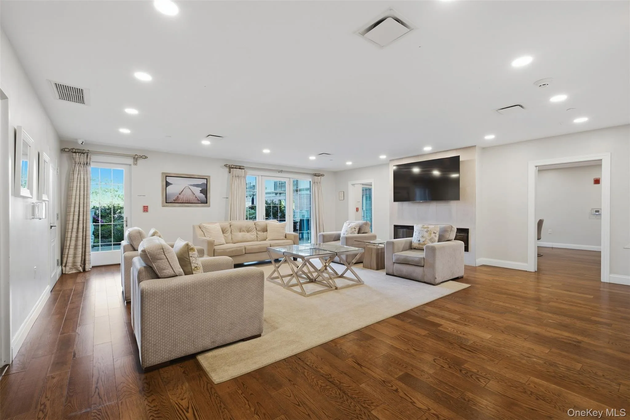 Community living room can be reserved for private events Community living room can be reserved for private events