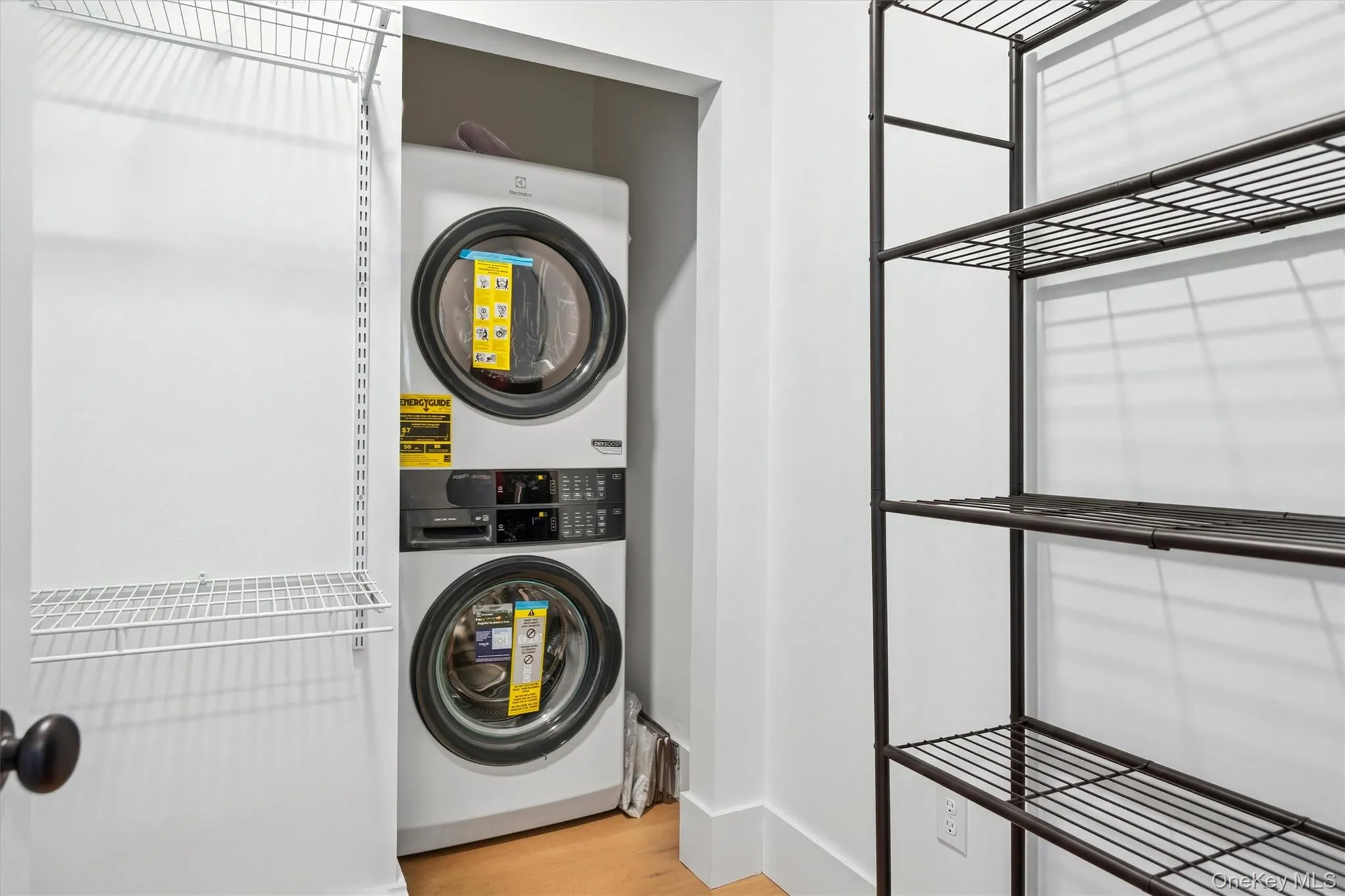 Primary Closet with additional Washer & Dryer. Primary Closet with additional Washer & Dryer.