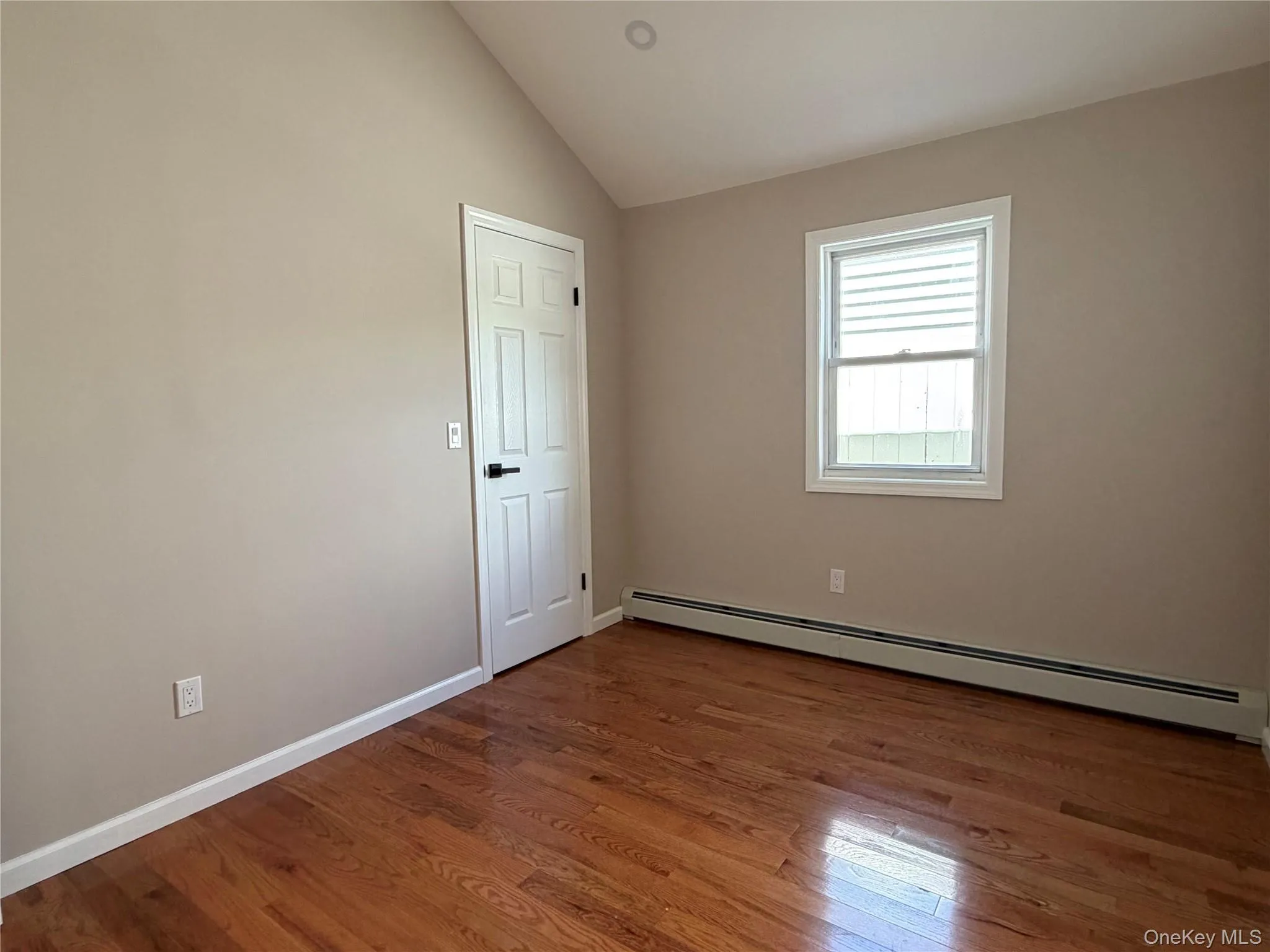 Another view of primary bedroom with large walk-in closet. Another view of primary bedroom with large walk-in closet.