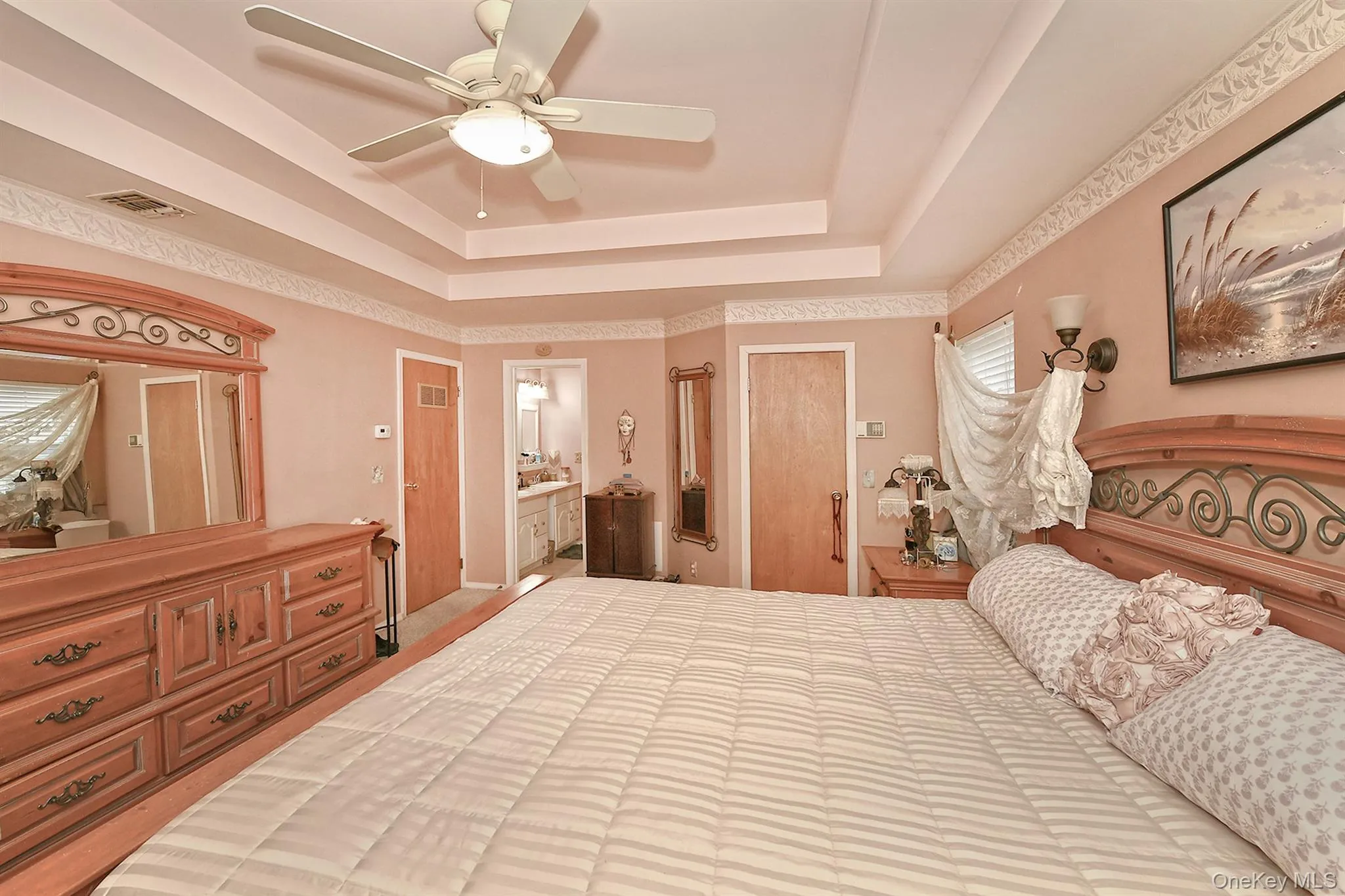 Primary Bedroom with Tray Ceiling Primary Bedroom with Tray Ceiling