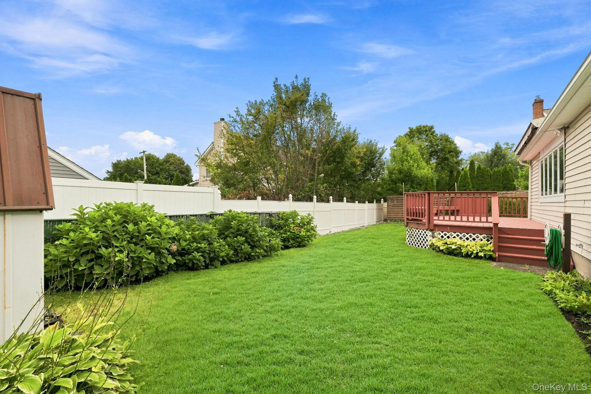 Enjoy easy outdoor living in this spacious fenced-in yard Enjoy easy outdoor living in this spacious fenced-in yard
