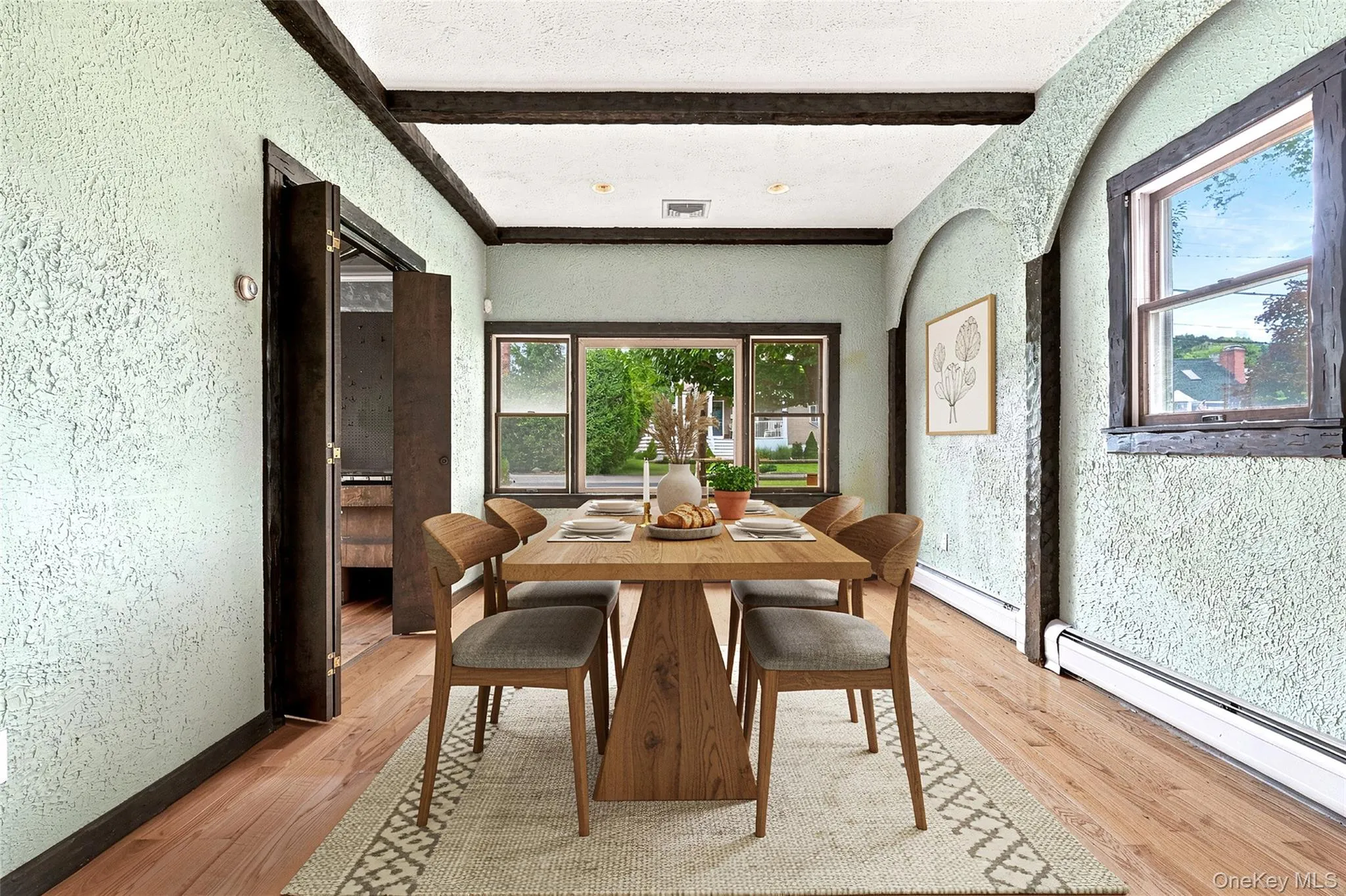 Versatile space that can easily be used as a dining area or family room Versatile space that can easily be used as a dining area or family room