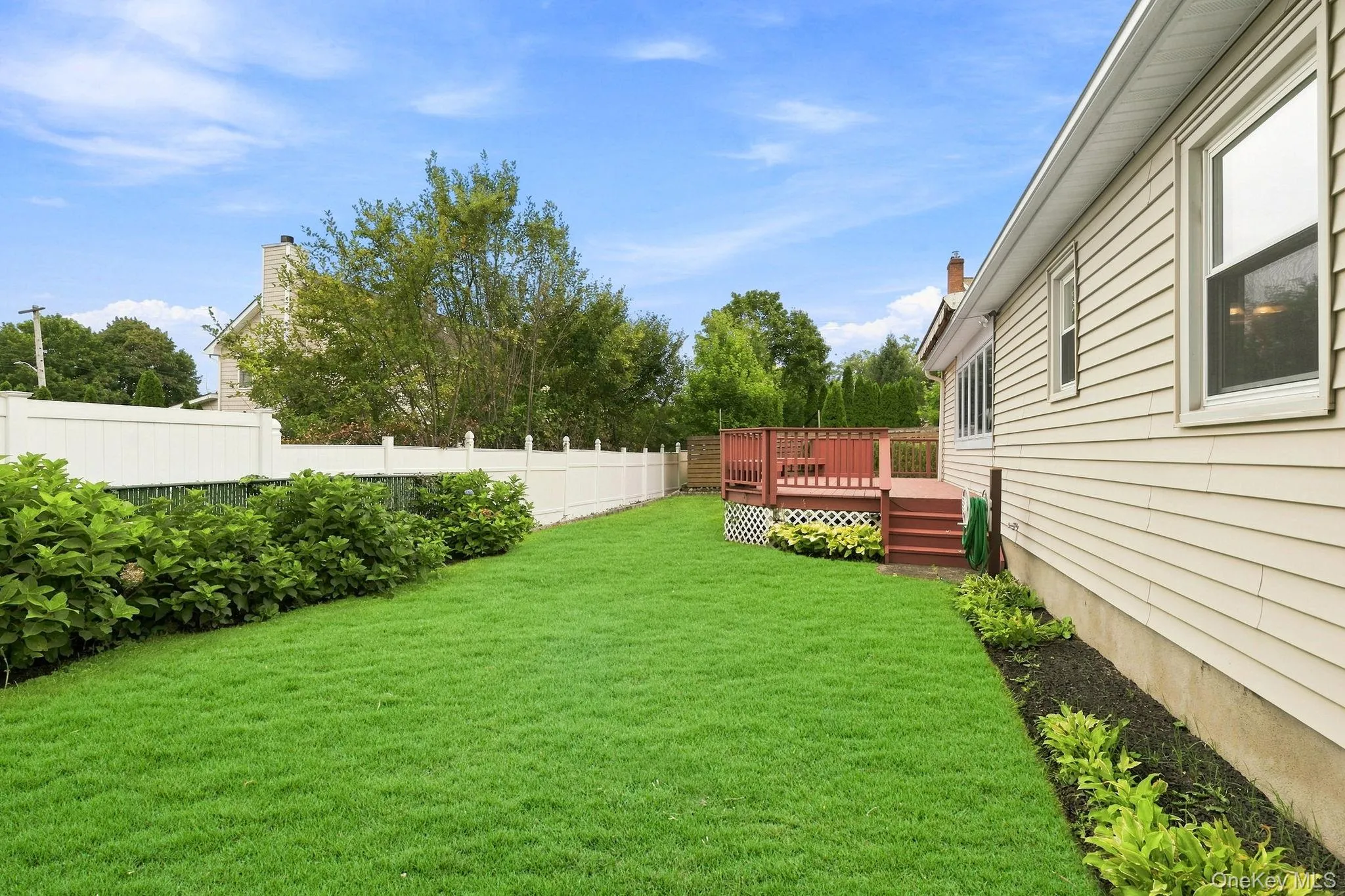 Lush greenery surrounds this inviting private outdoor setting Lush greenery surrounds this inviting private outdoor setting