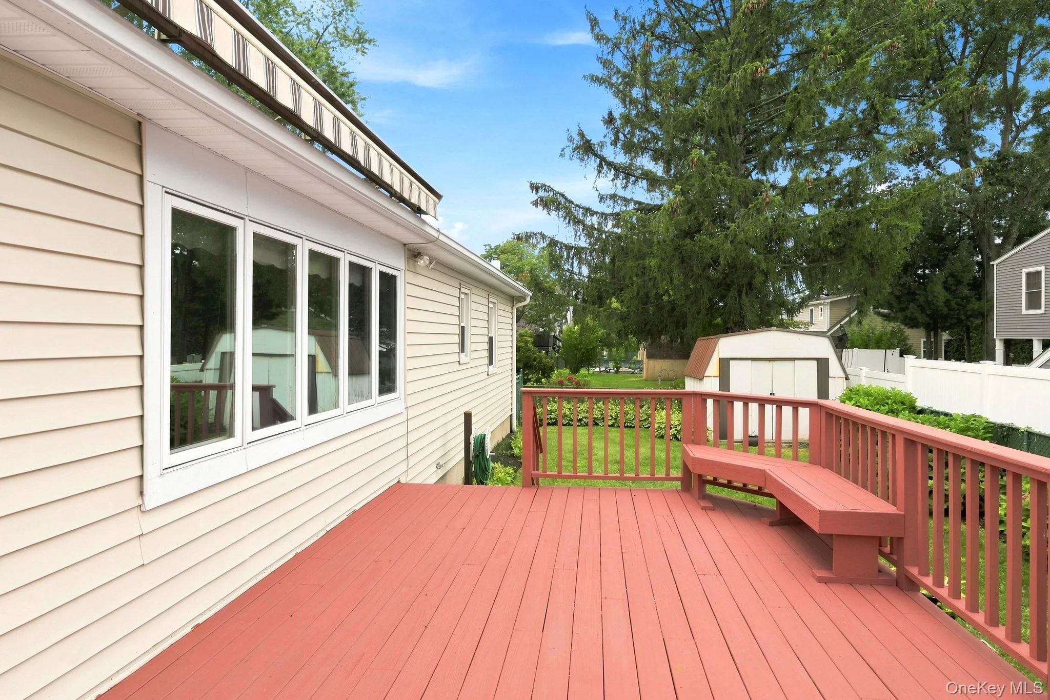 Enjoy the outdoors from the expansive deck overlooking the private backyard Enjoy the outdoors from the expansive deck overlooking the private backyard
