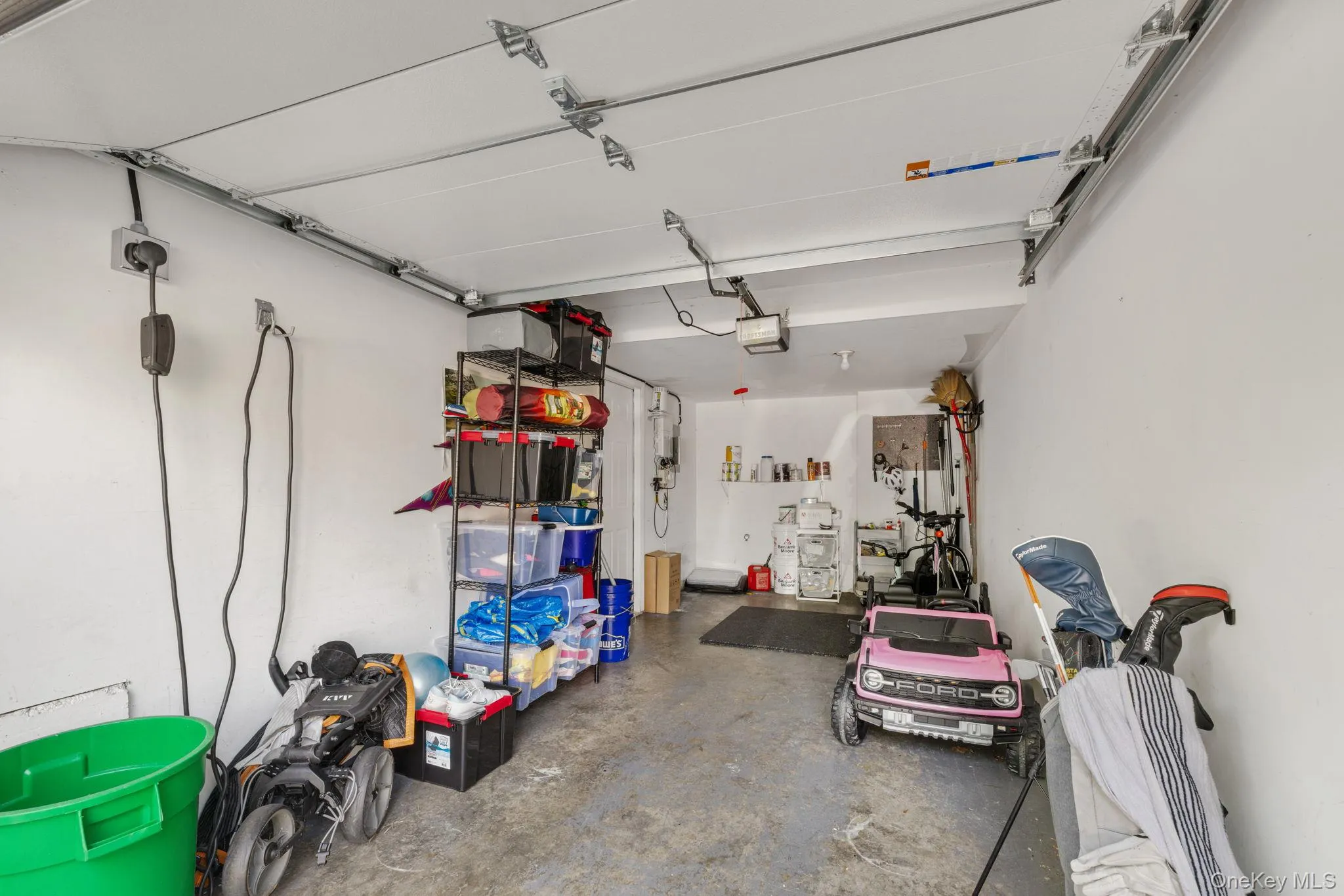 One car garage with automatic door opener and convenient interior access. One car garage with automatic door opener and convenient interior access.