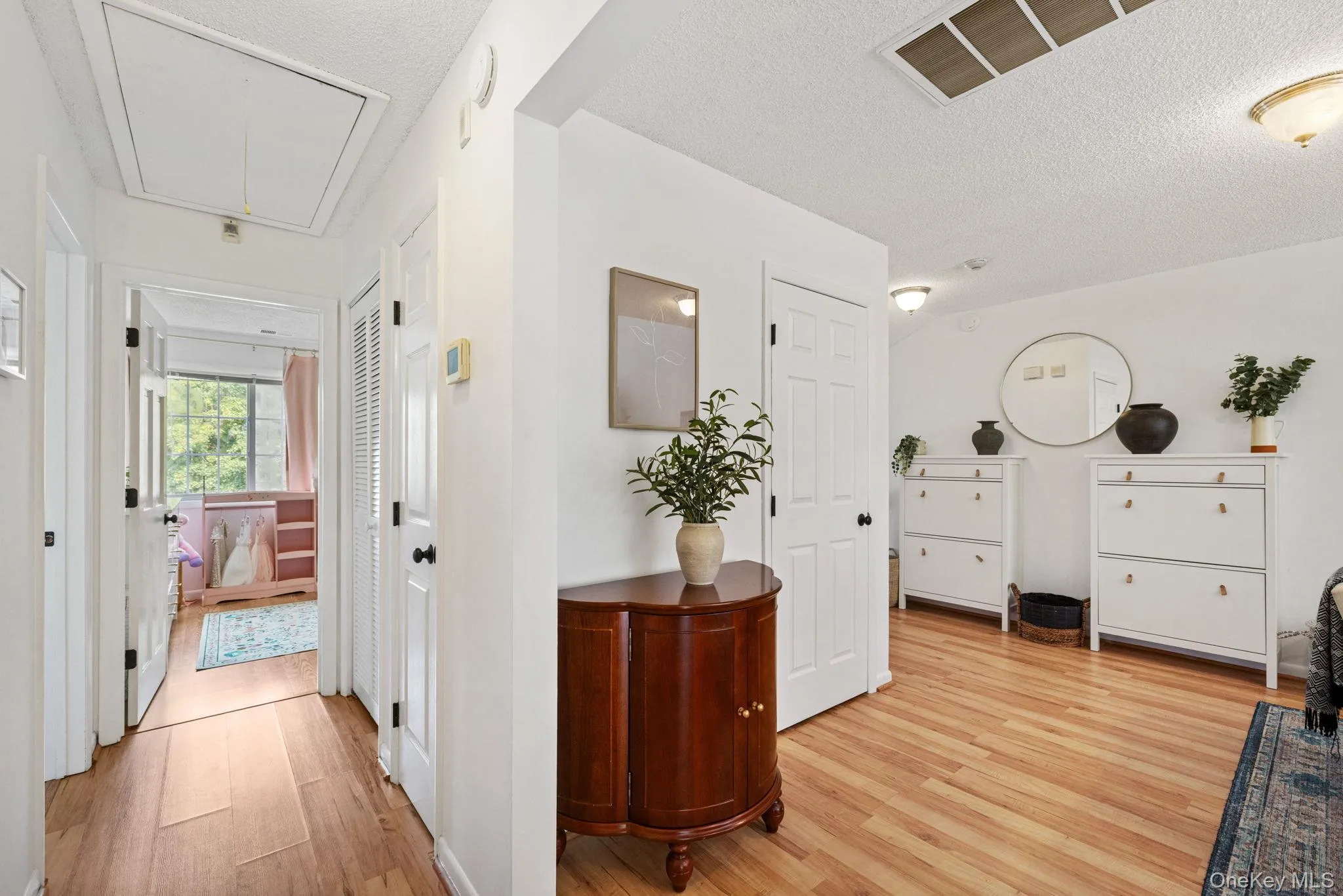 The hallway leads to the bedrooms. The hallway leads to the bedrooms.