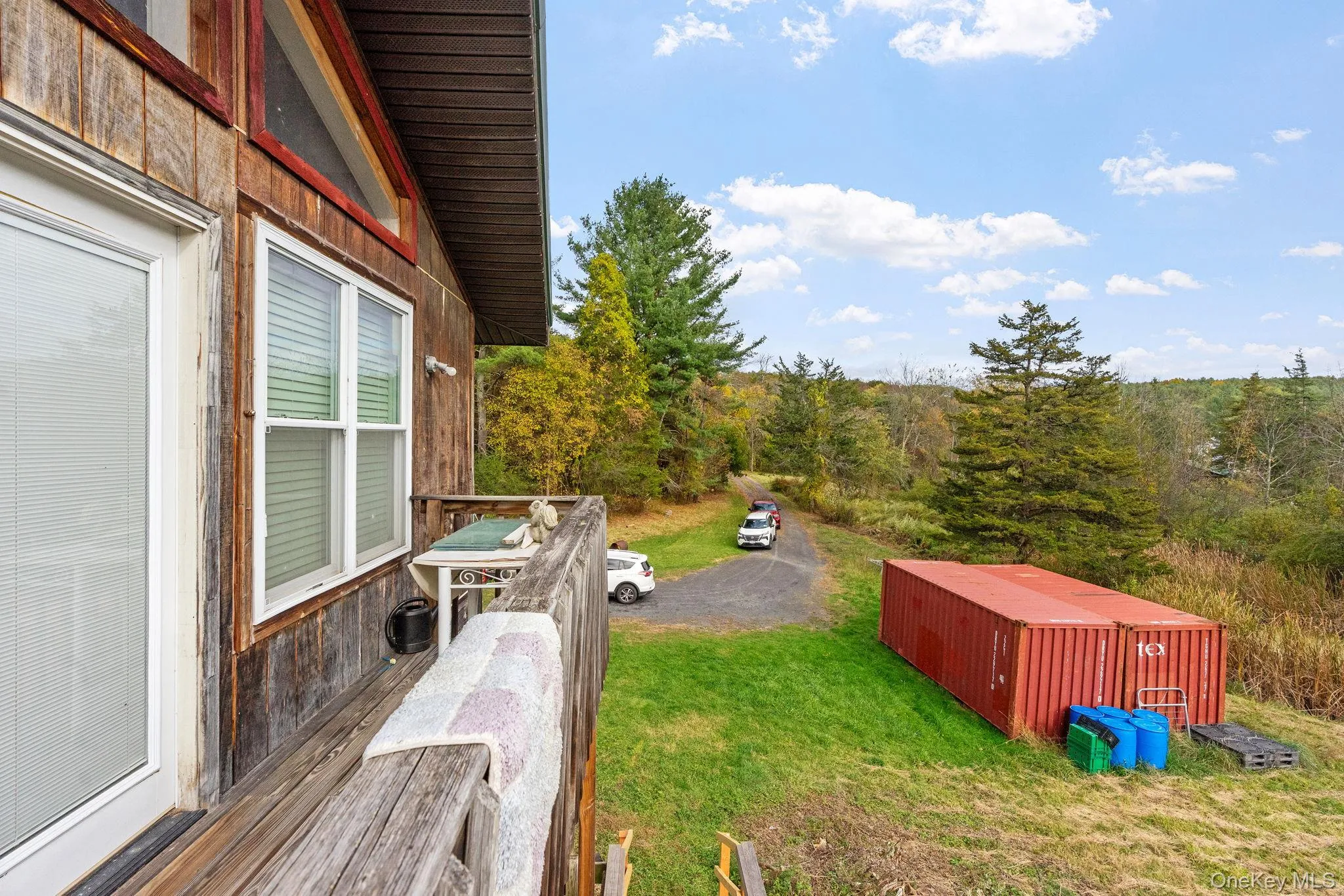View of grassy yard featuring an outdoor structure View of grassy yard featuring an outdoor structure
