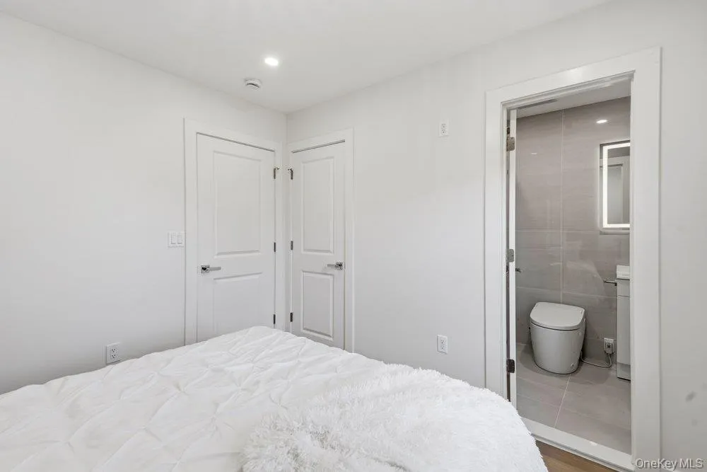 2nd Ensuite Bedroom featuring recessed lighting and white paneled doors 2nd Ensuite Bedroom featuring recessed lighting and white paneled doors